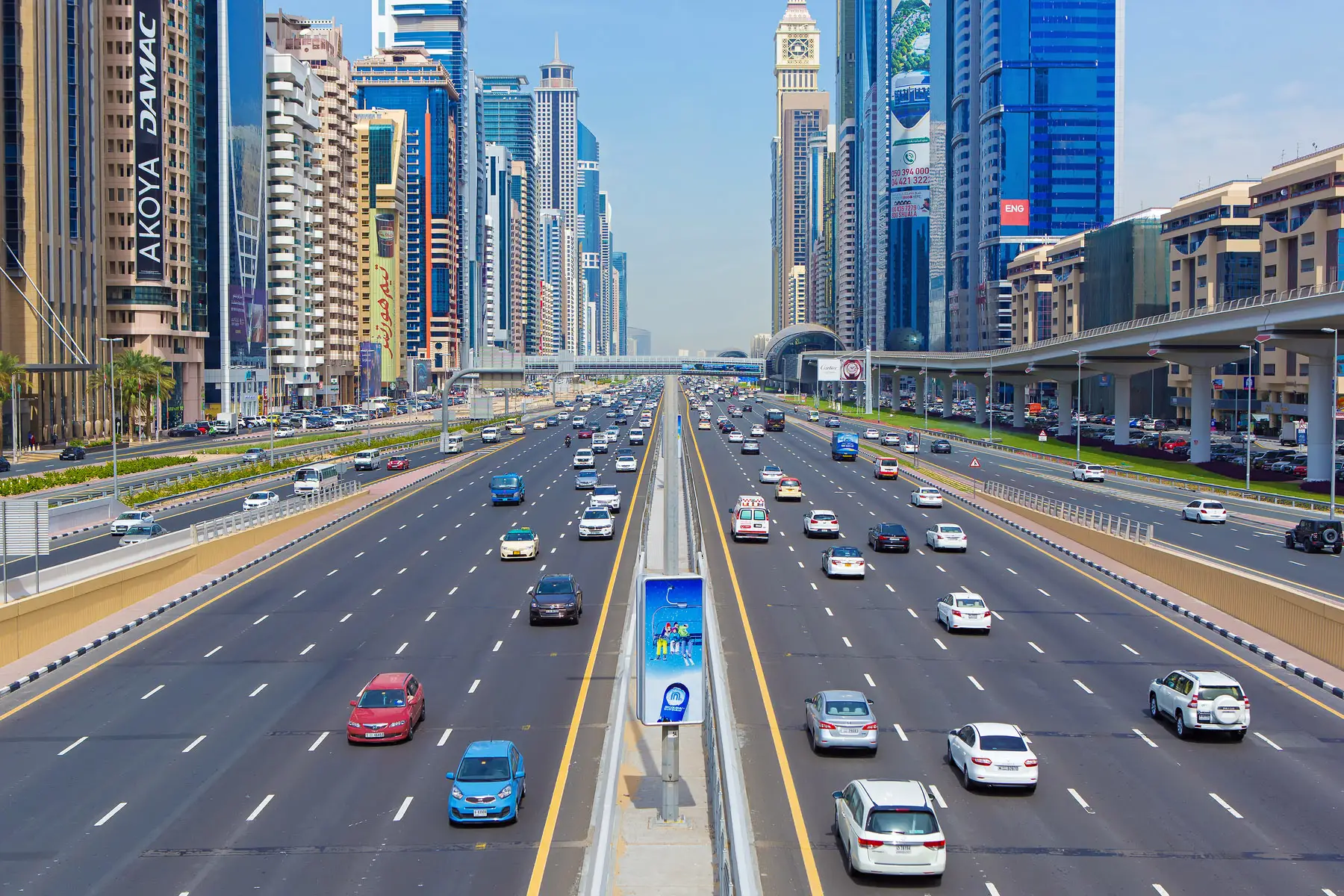 cars driving along the Sheikh Zayed Road in Dubai