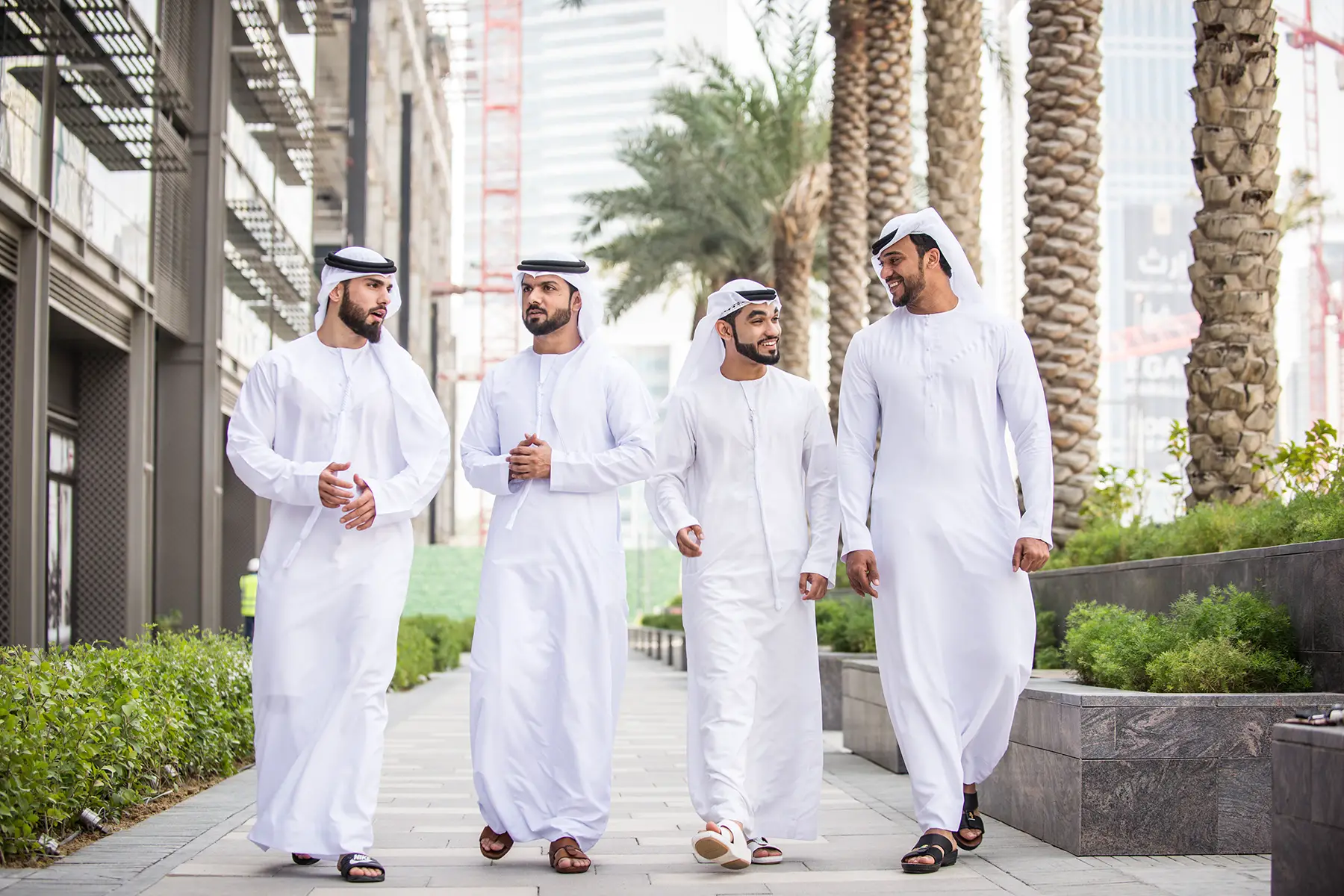 Emirati businessmen walking