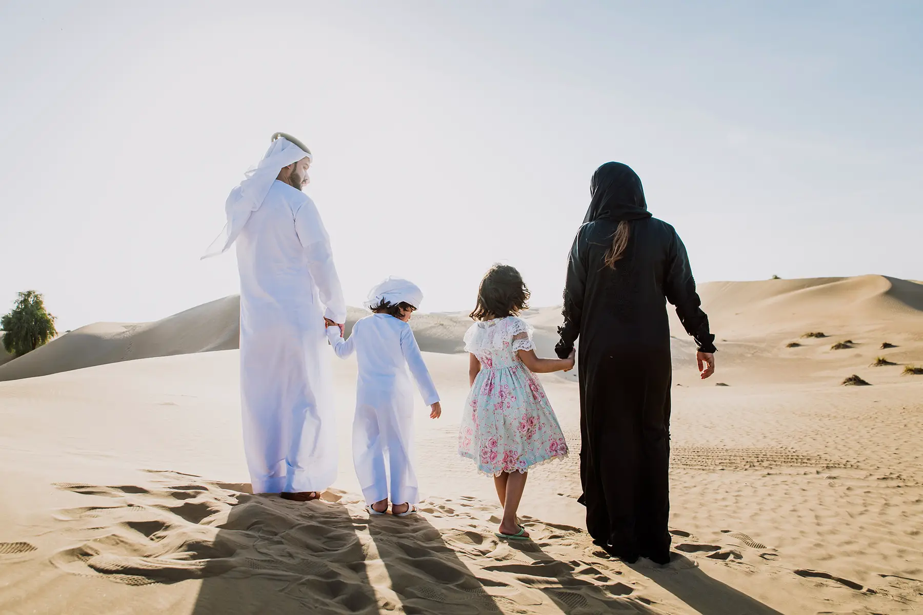 Emirati family in the desert