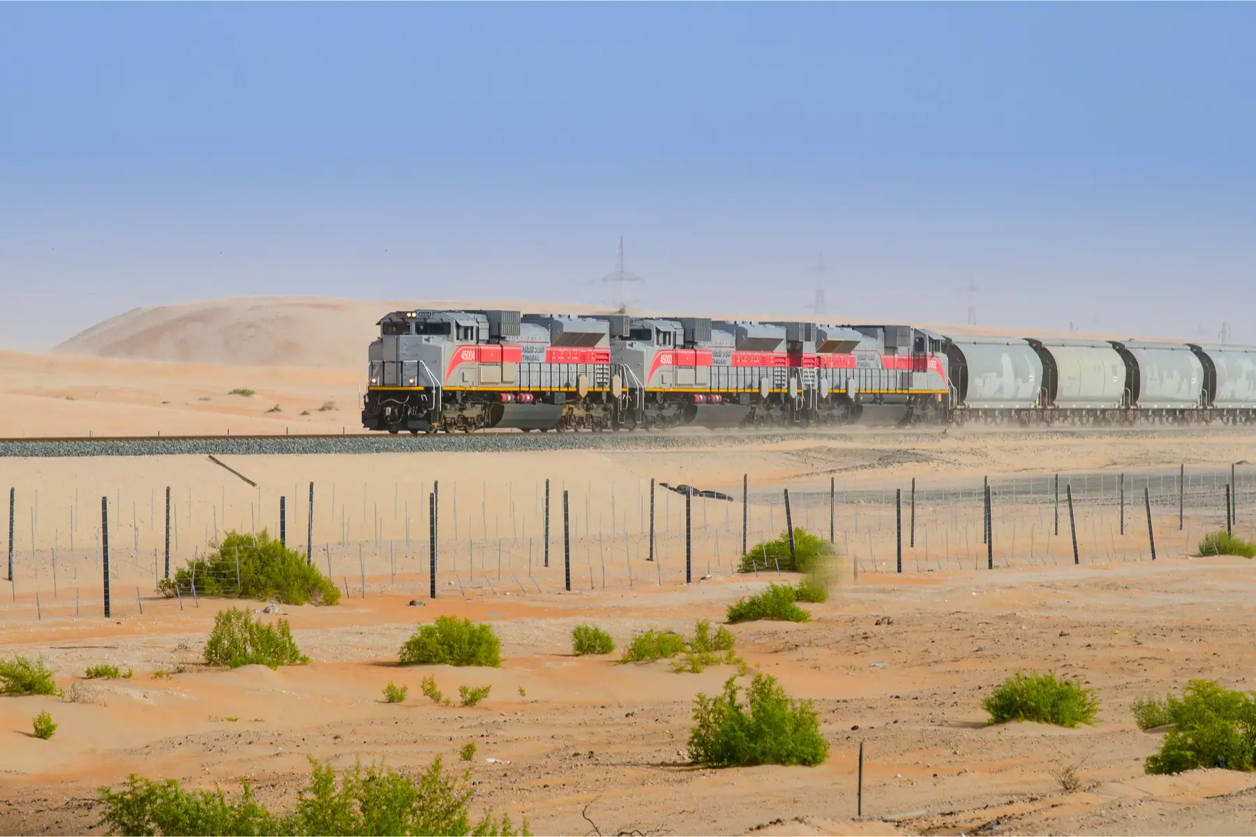 removals to UAE: a freight train in the  Liwa desert of Abu Dhabi