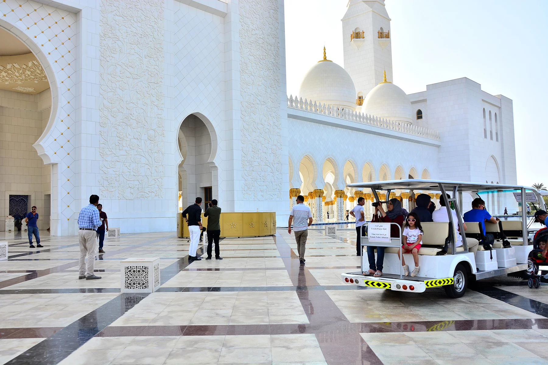 People outside Sheikh Zayed Grand Mosque