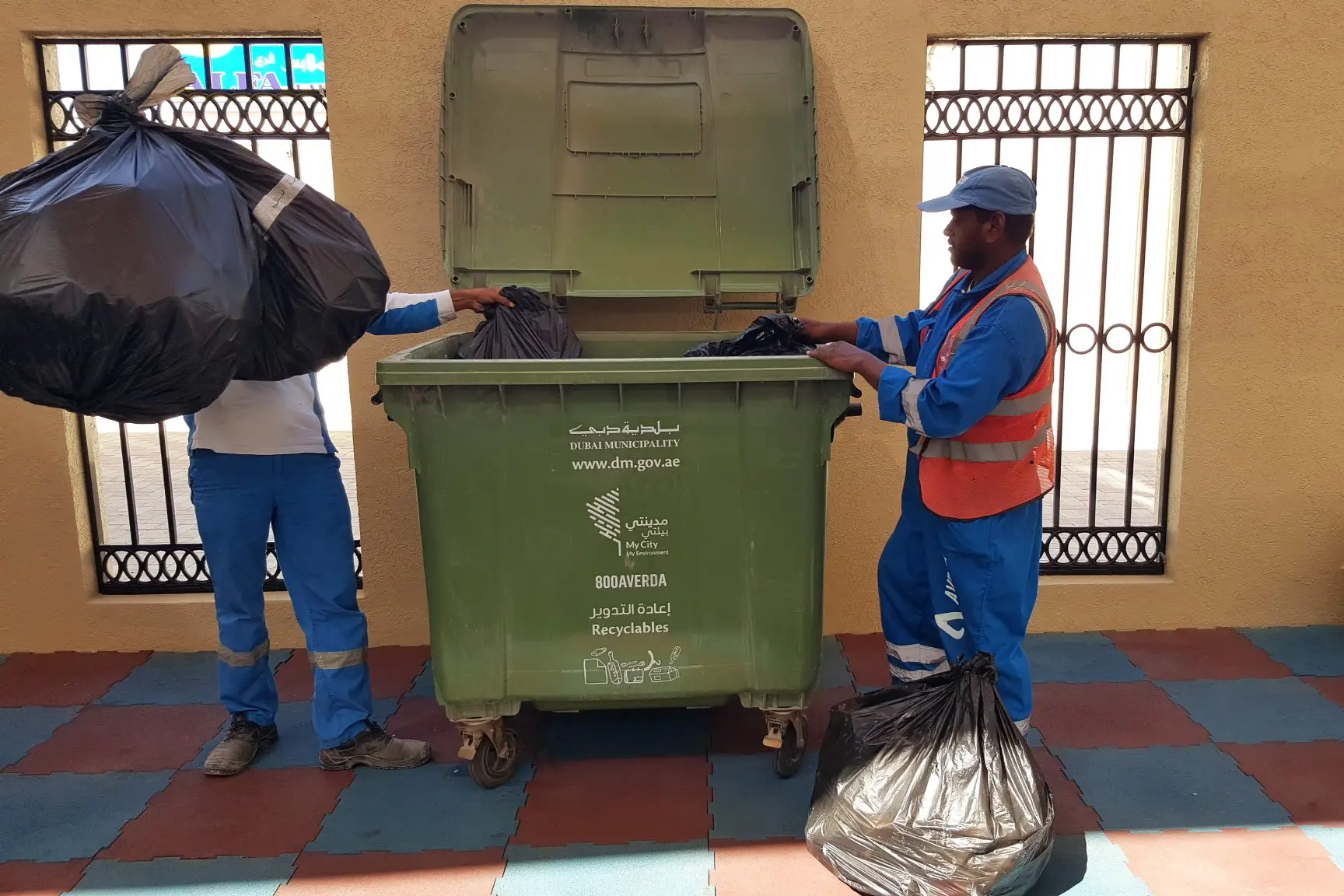 Trash collectors in Dubai