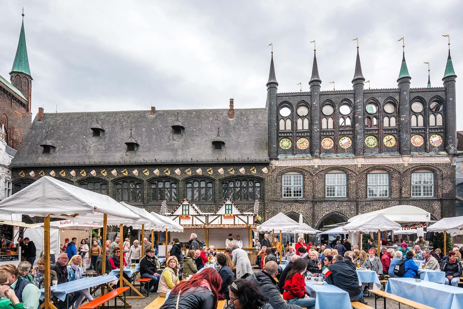 People meeting for a beer on a square in Lübeck
