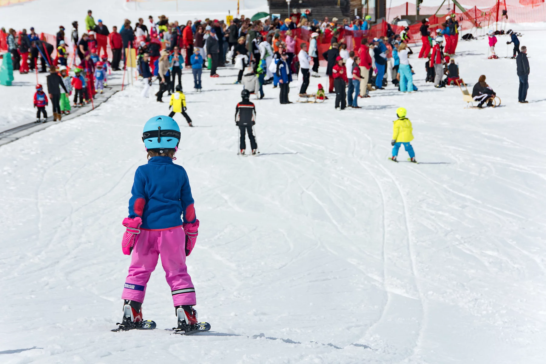 Children skiing while on holiday in Austria