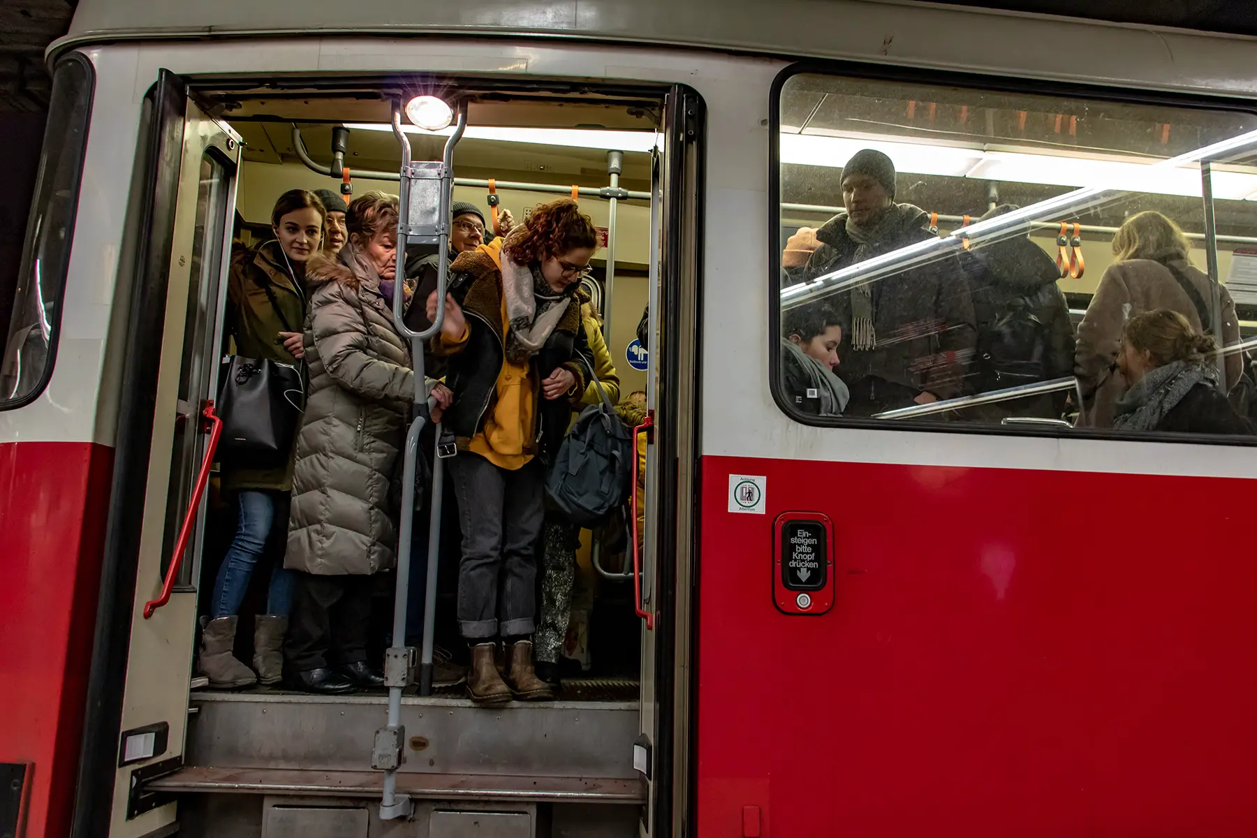Commuters on a busy tram in Vienna