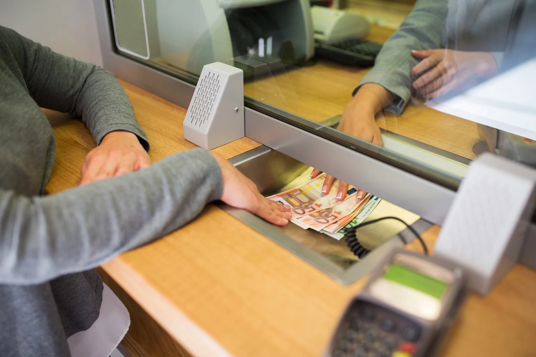 Customer paying in euros at a money transfer office