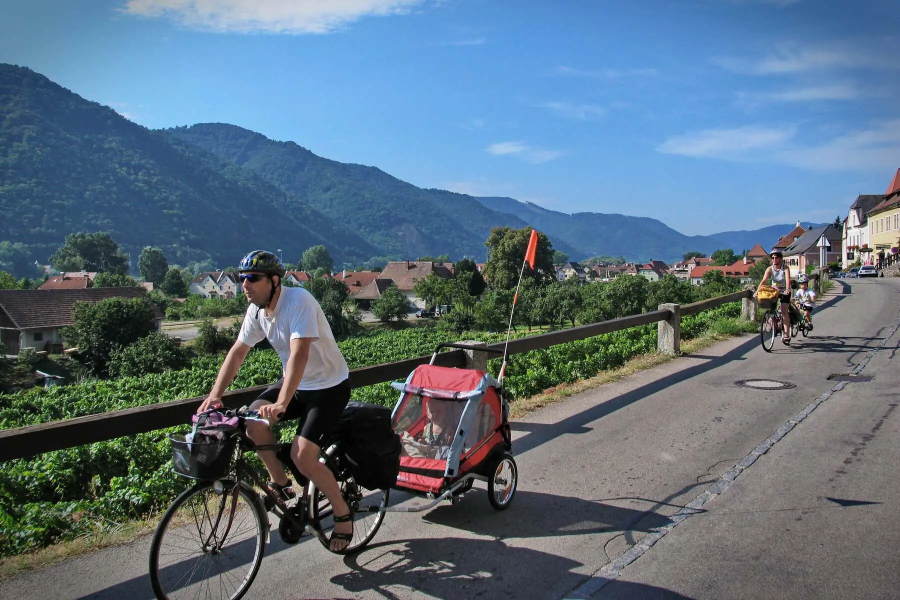 Family cycling through Austria
