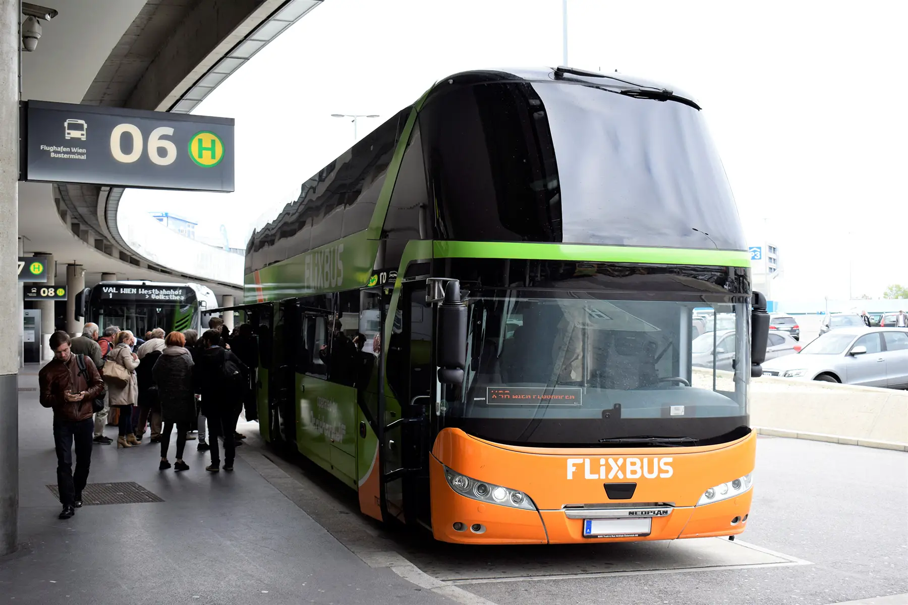 Passengers board a Flixbus at Vienna International Airport