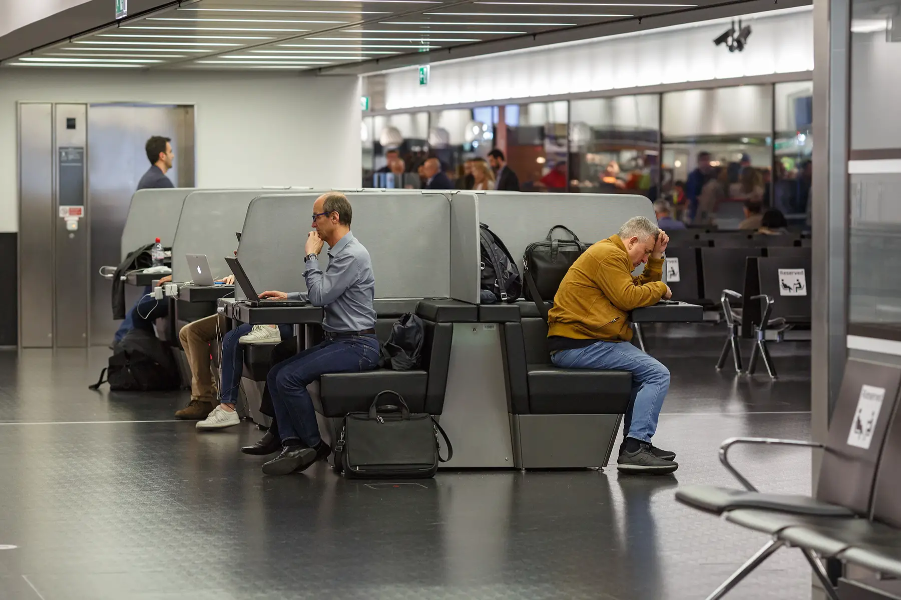 Freelancers working while waiting for their flights at Vienna International Airport