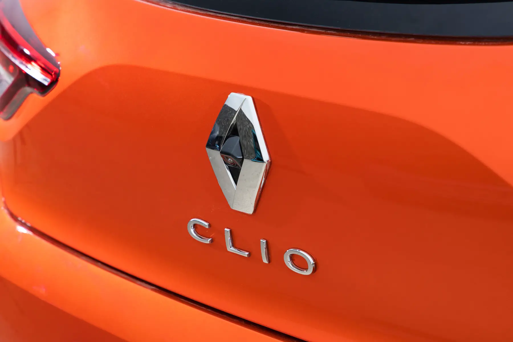 An orange Renault Clio