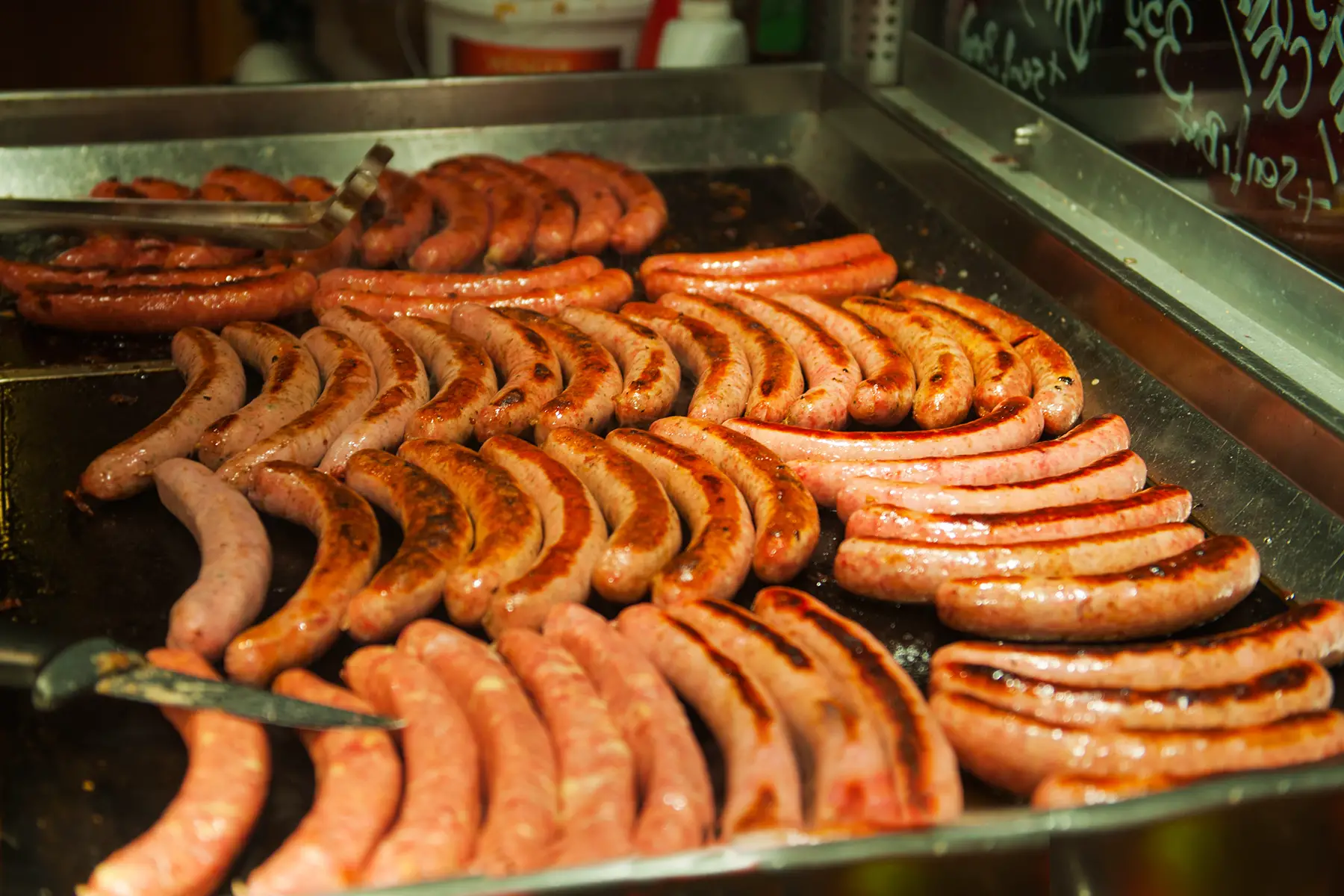Wiener Würstchen on the grill at a Würstelstand in Vienna