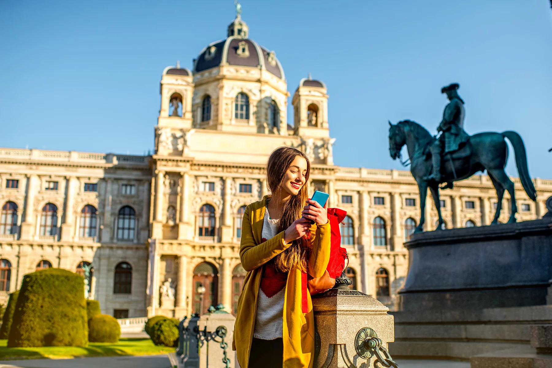 Woman using her smartphone in Vienna