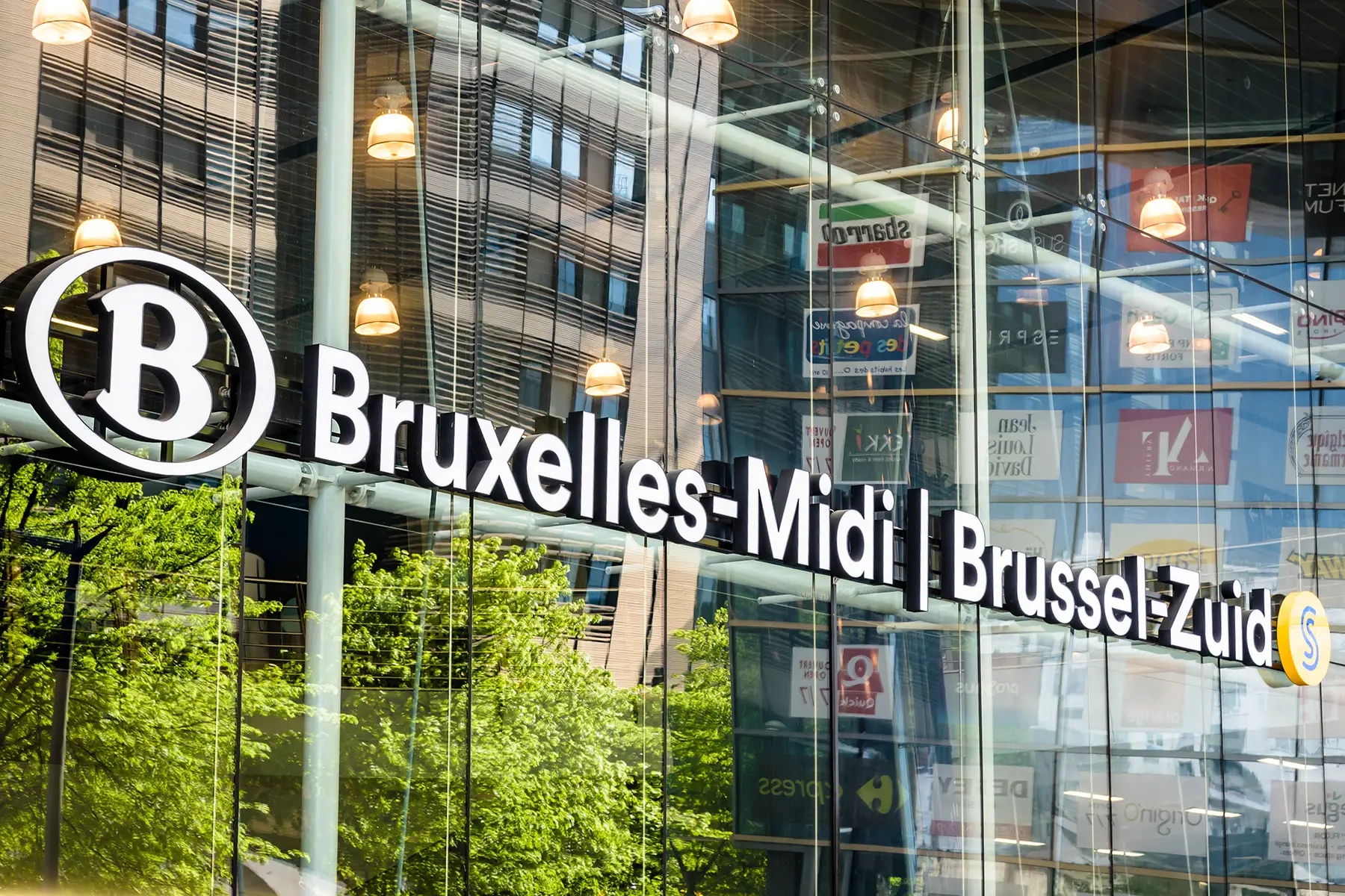 Bilingual train station sign in Brussels, Belgium
