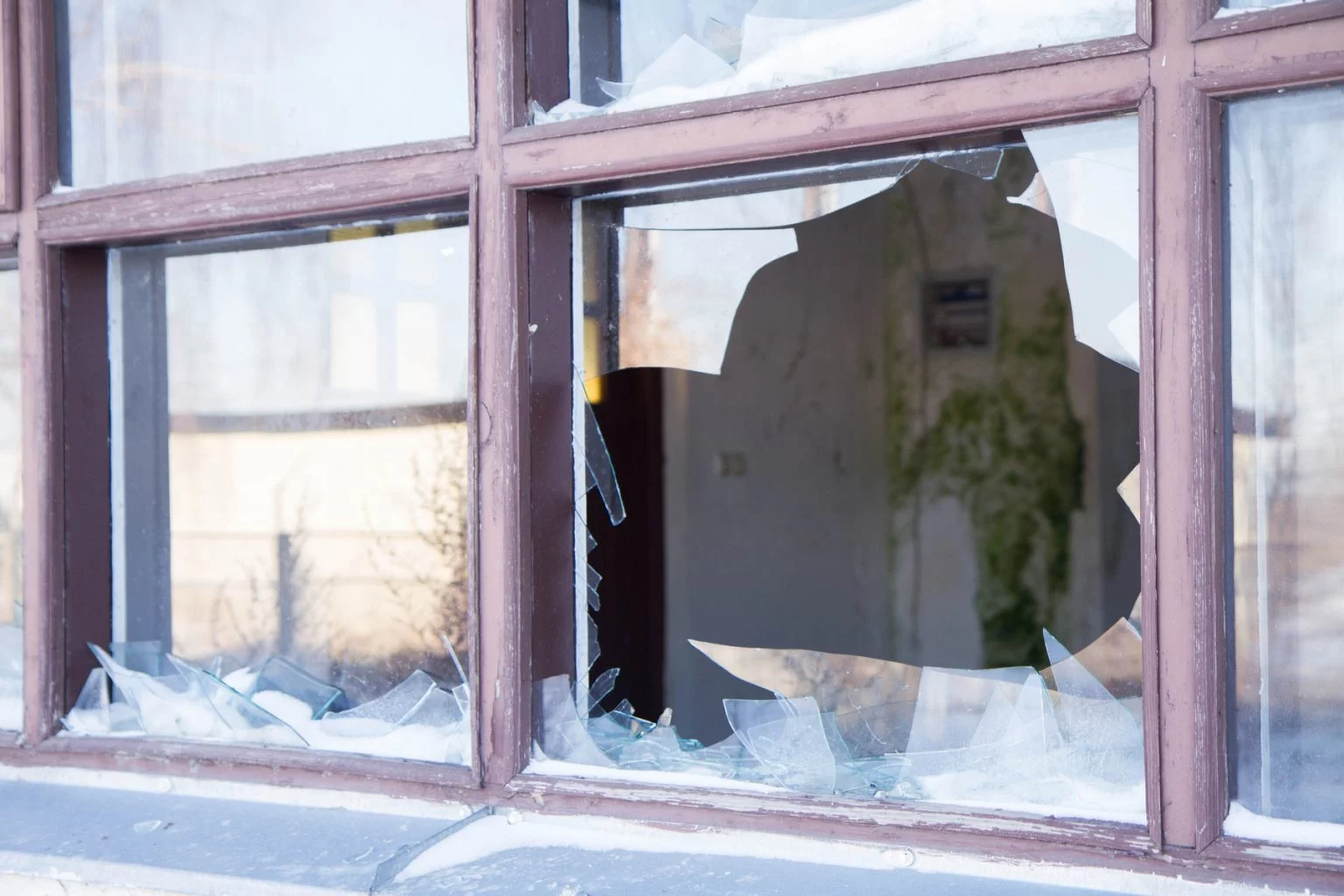 homeowners insurance: a broken window 