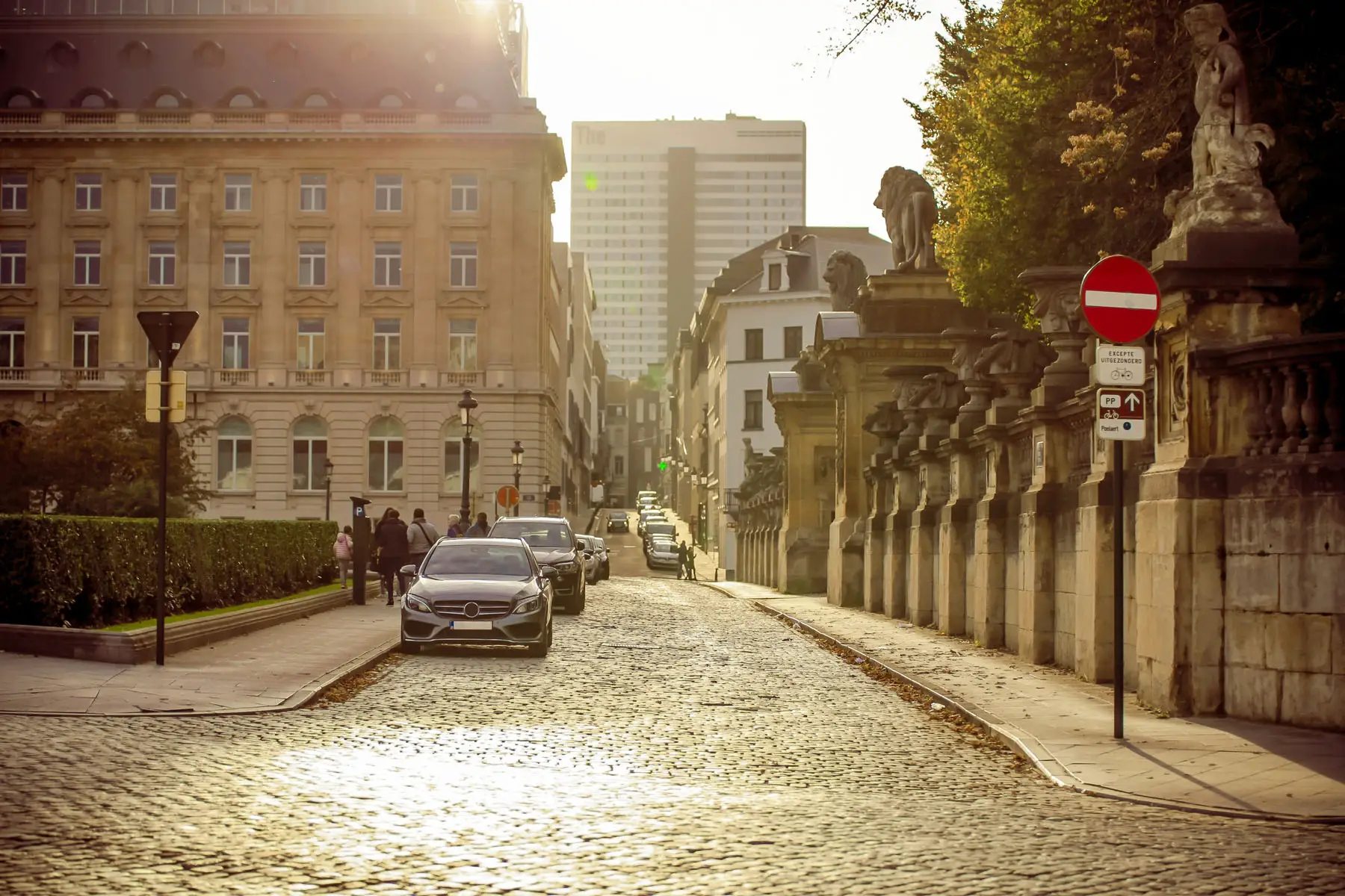 cars parked on a street in Brussels, Belgium