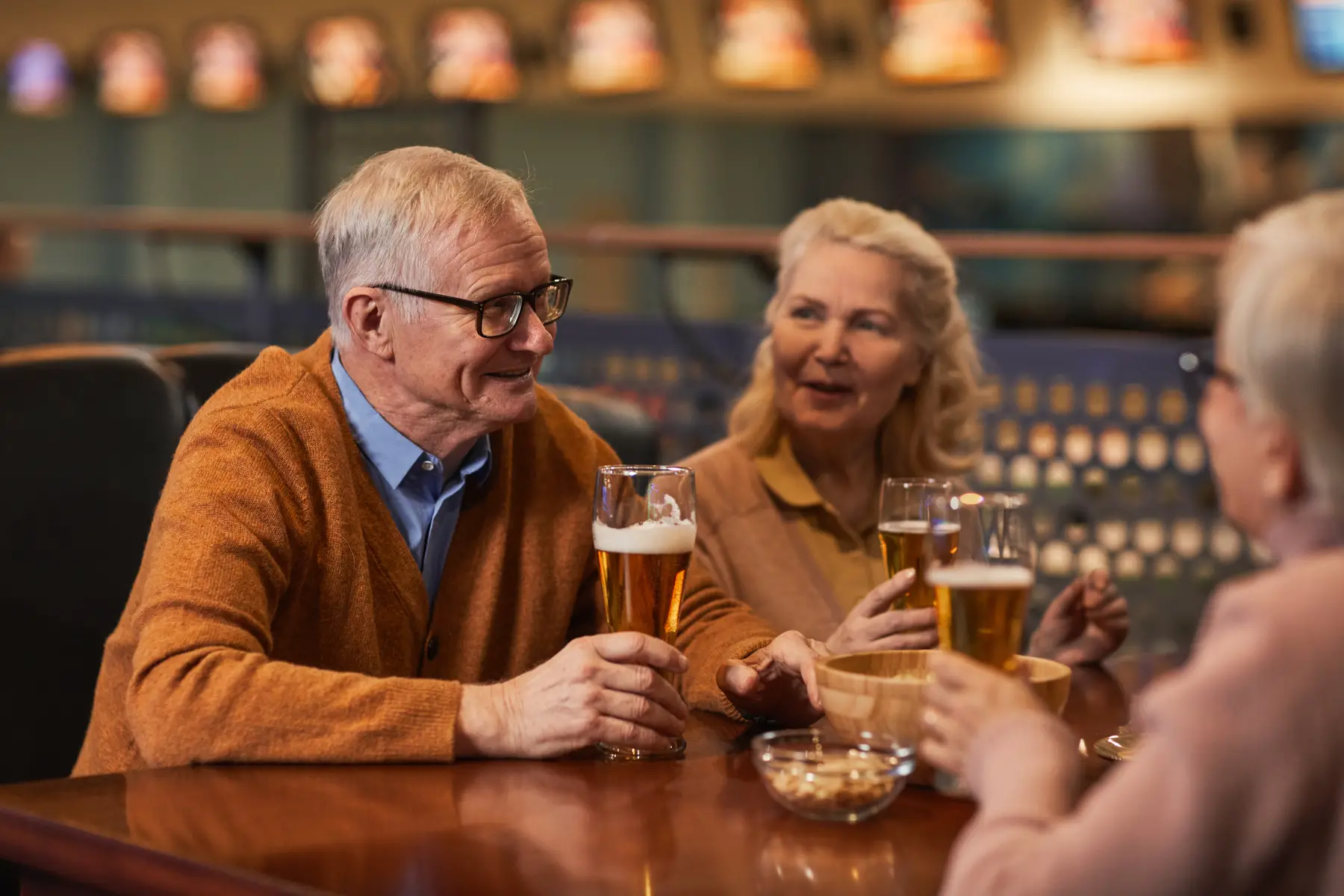 elderly group get together at beer cafe