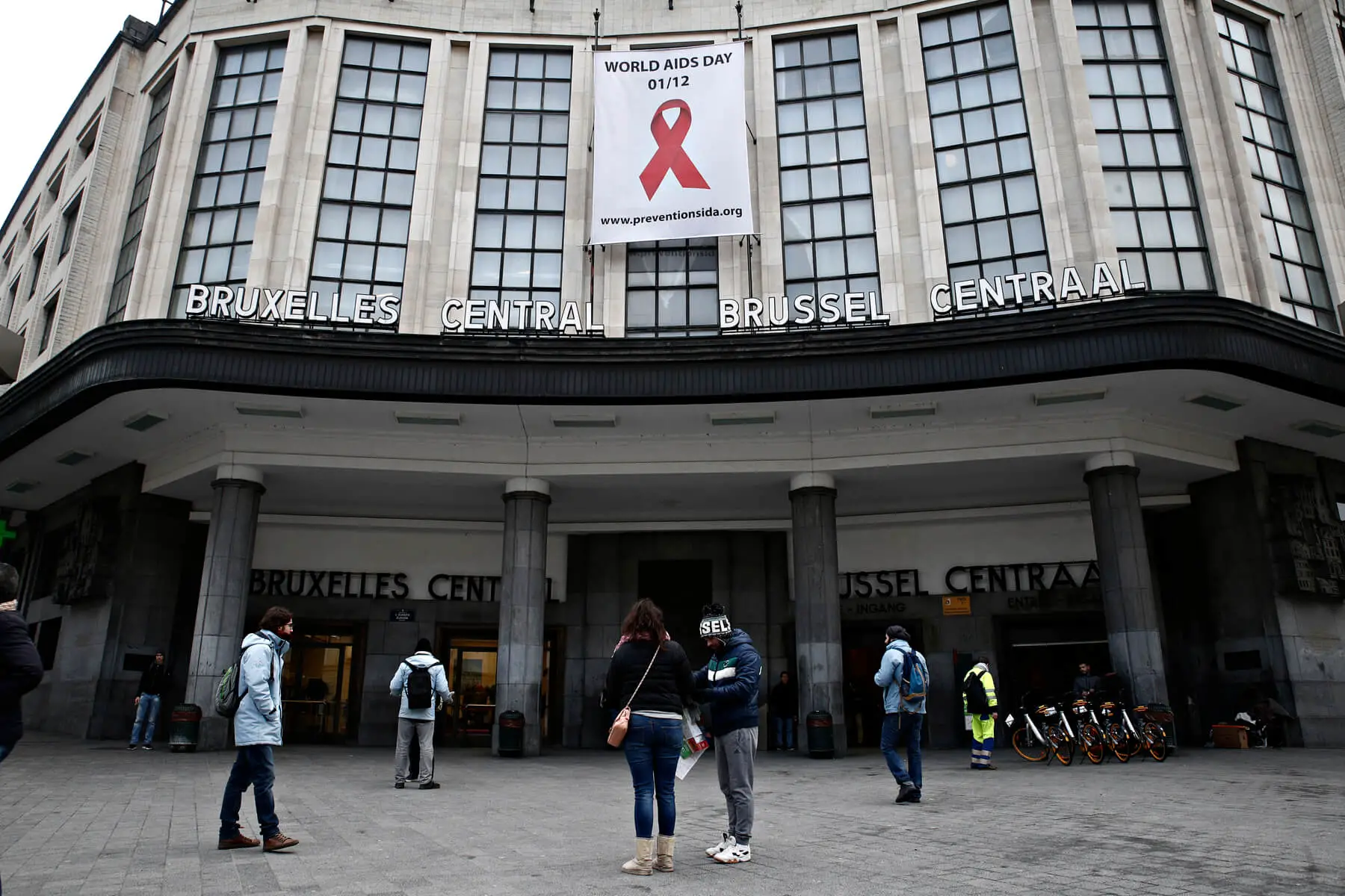 World AIDS Day campaign poster outside Brussels Central Station
