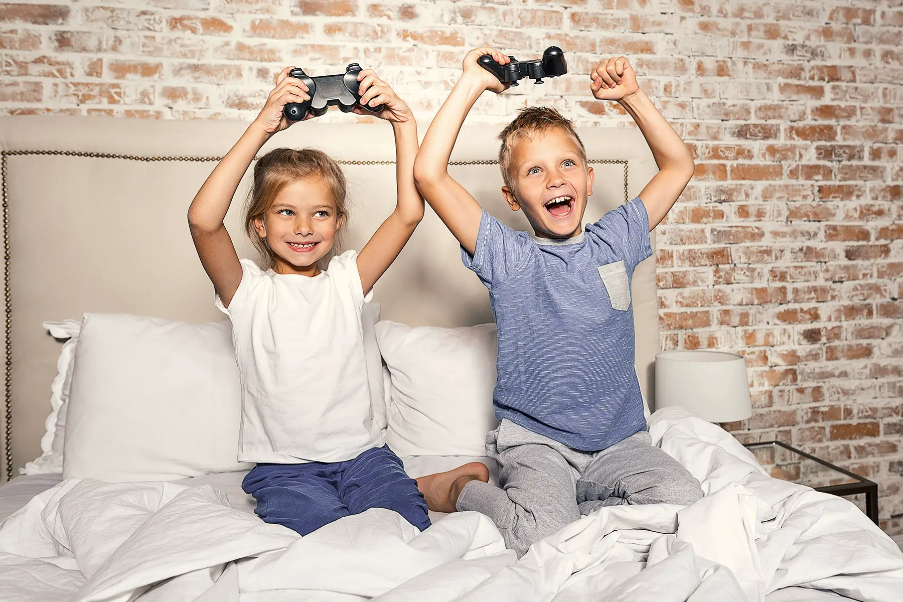 Young children playing videogames