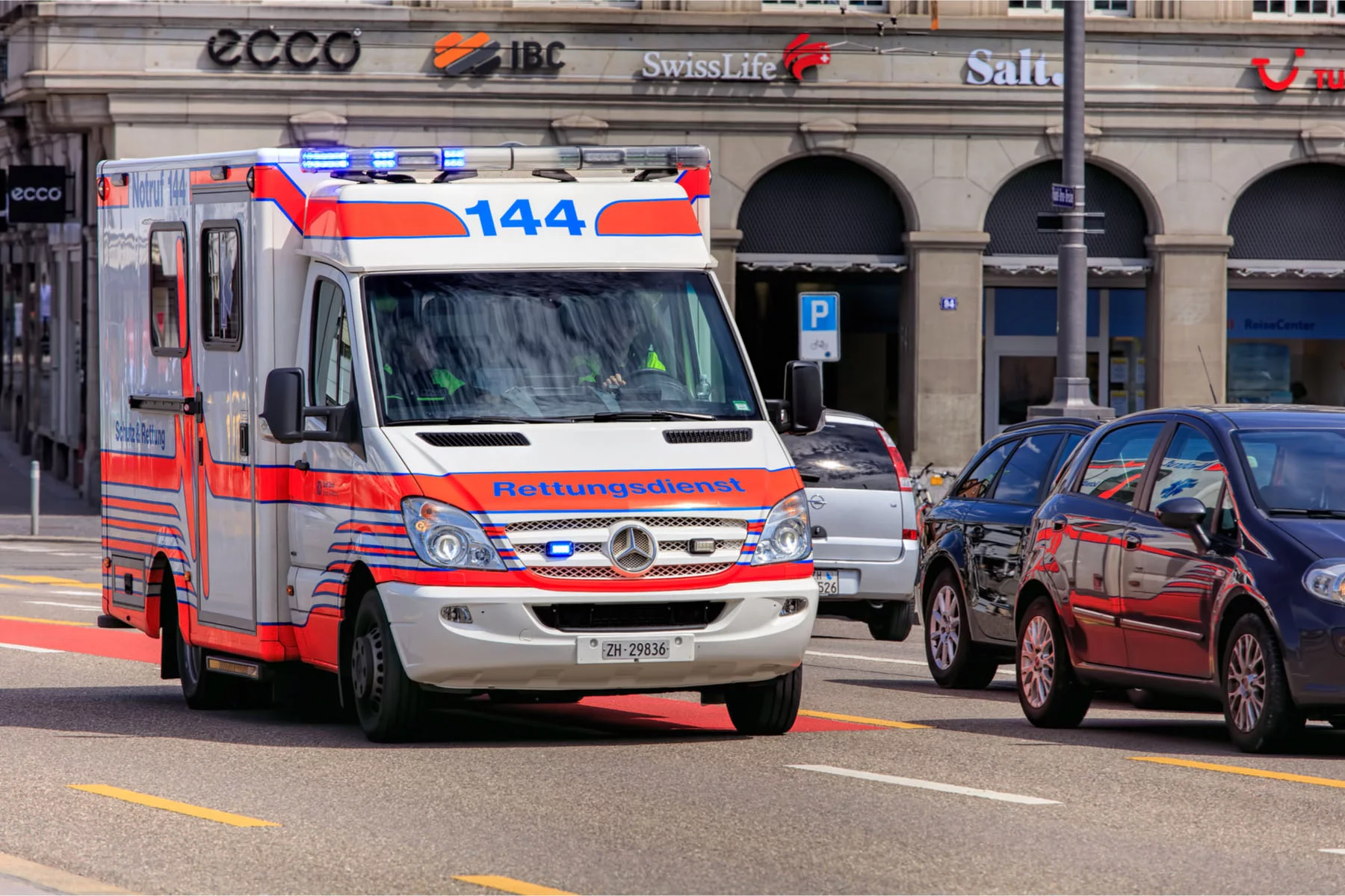 emergency admissions: an ambulance on the road in Zurich, Switzerland