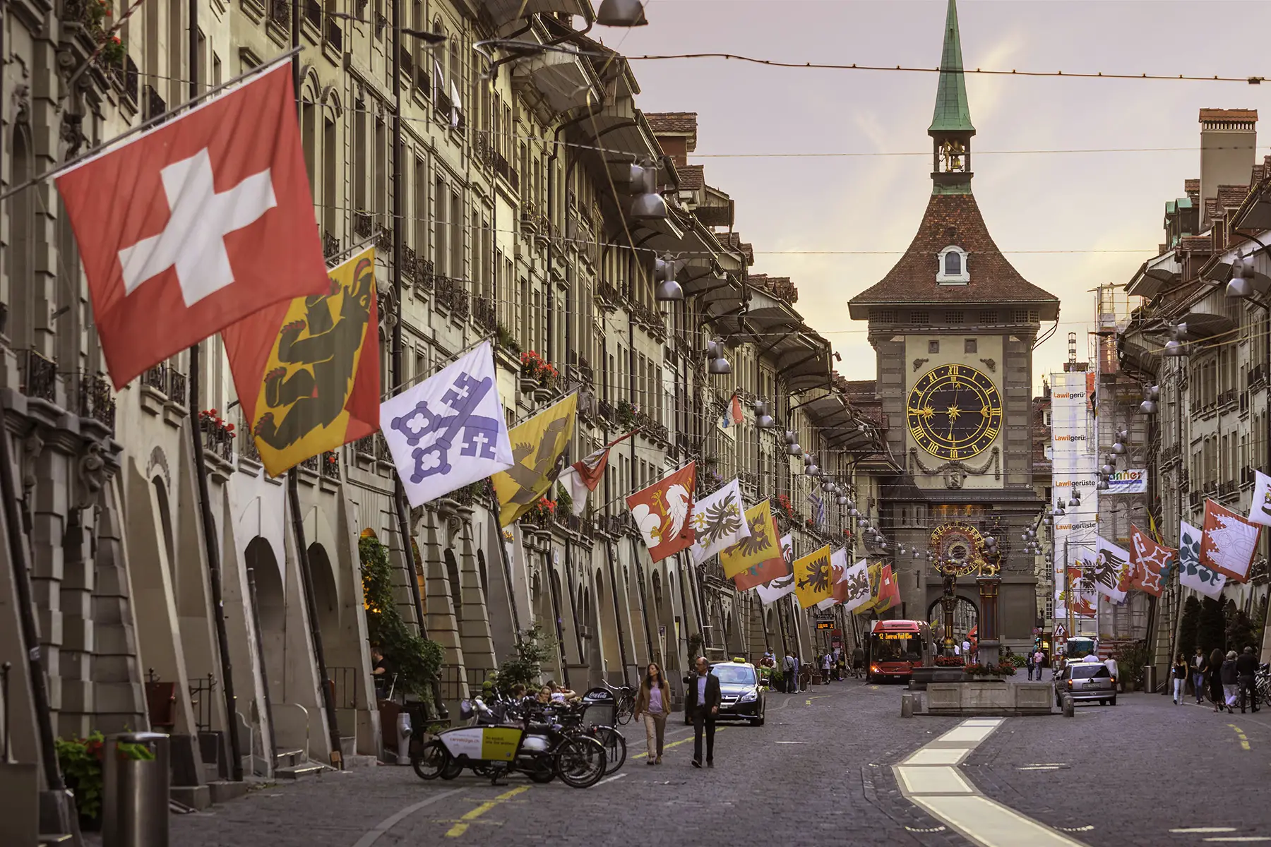 The busy Kramgasse in Bern at sunset