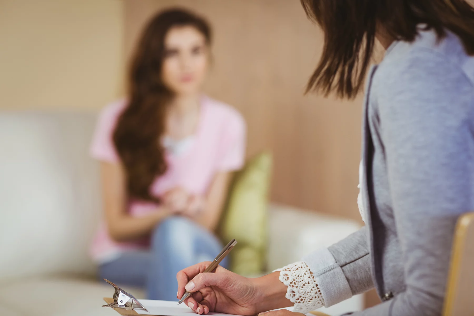 a pregnant woman having counseling