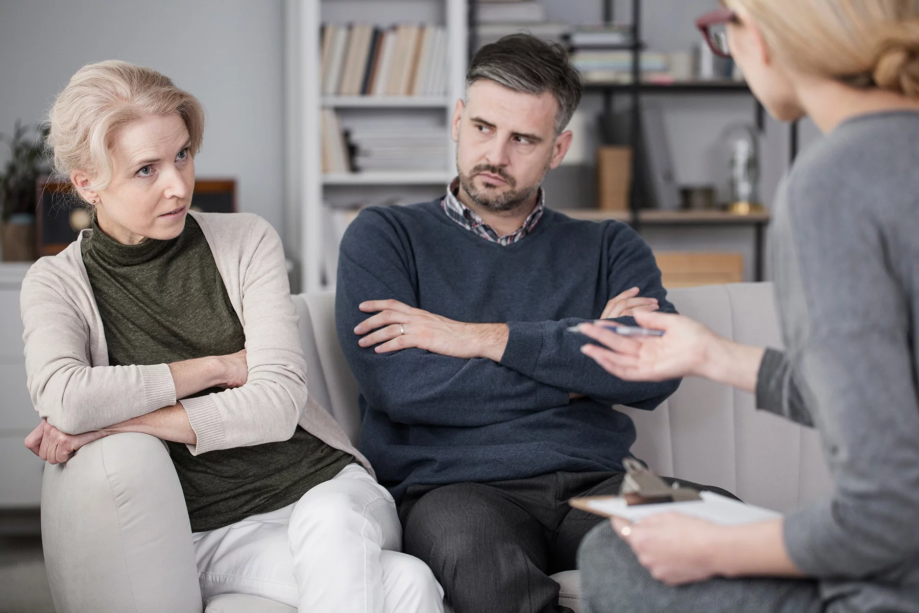 Couple speaking with a divorce mediator