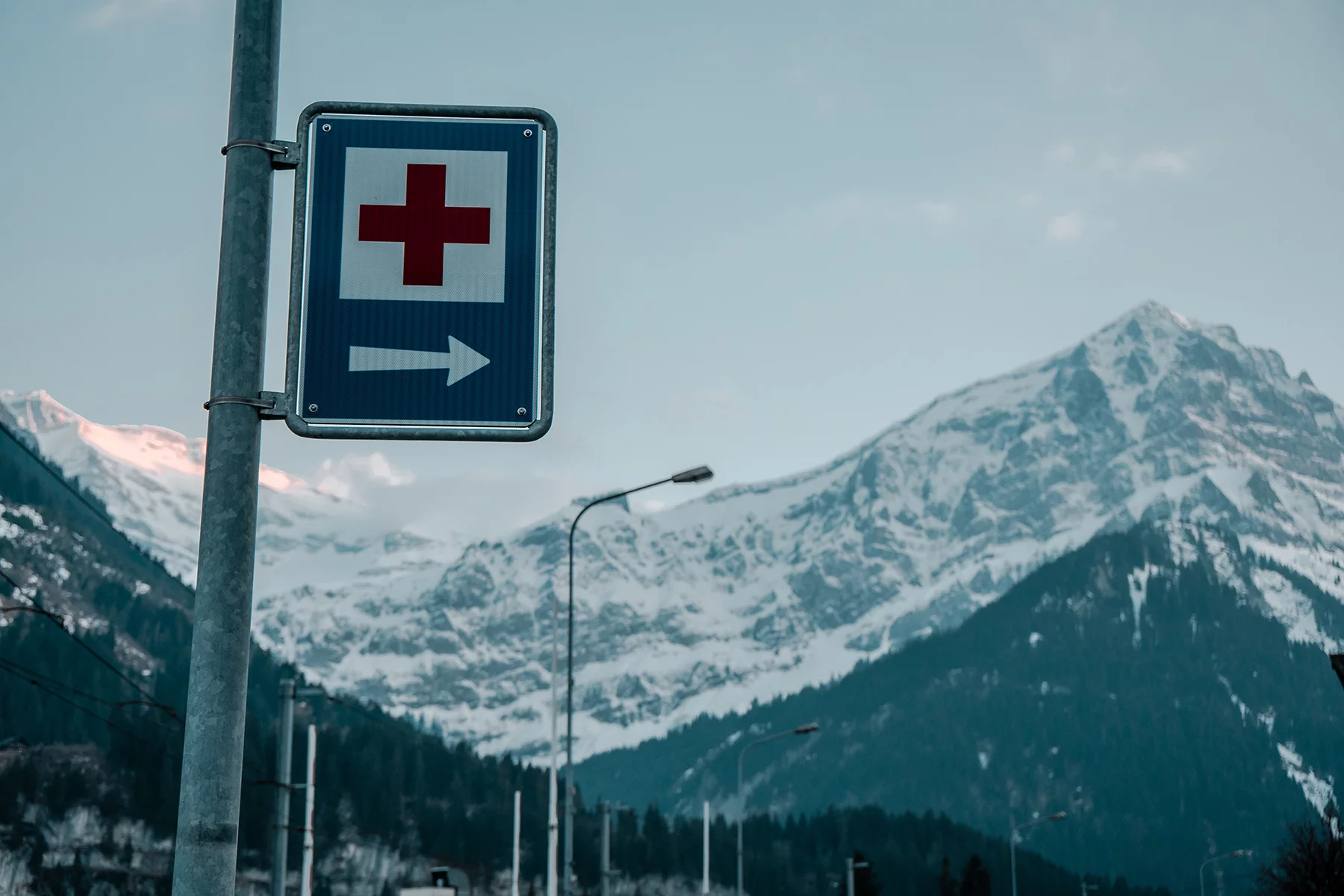 A sign showing the way to a hospital in Champéry, Switzerland