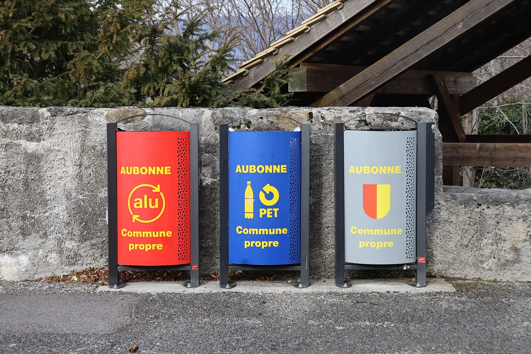 Three recycling bins in Aubonne, Switzerland