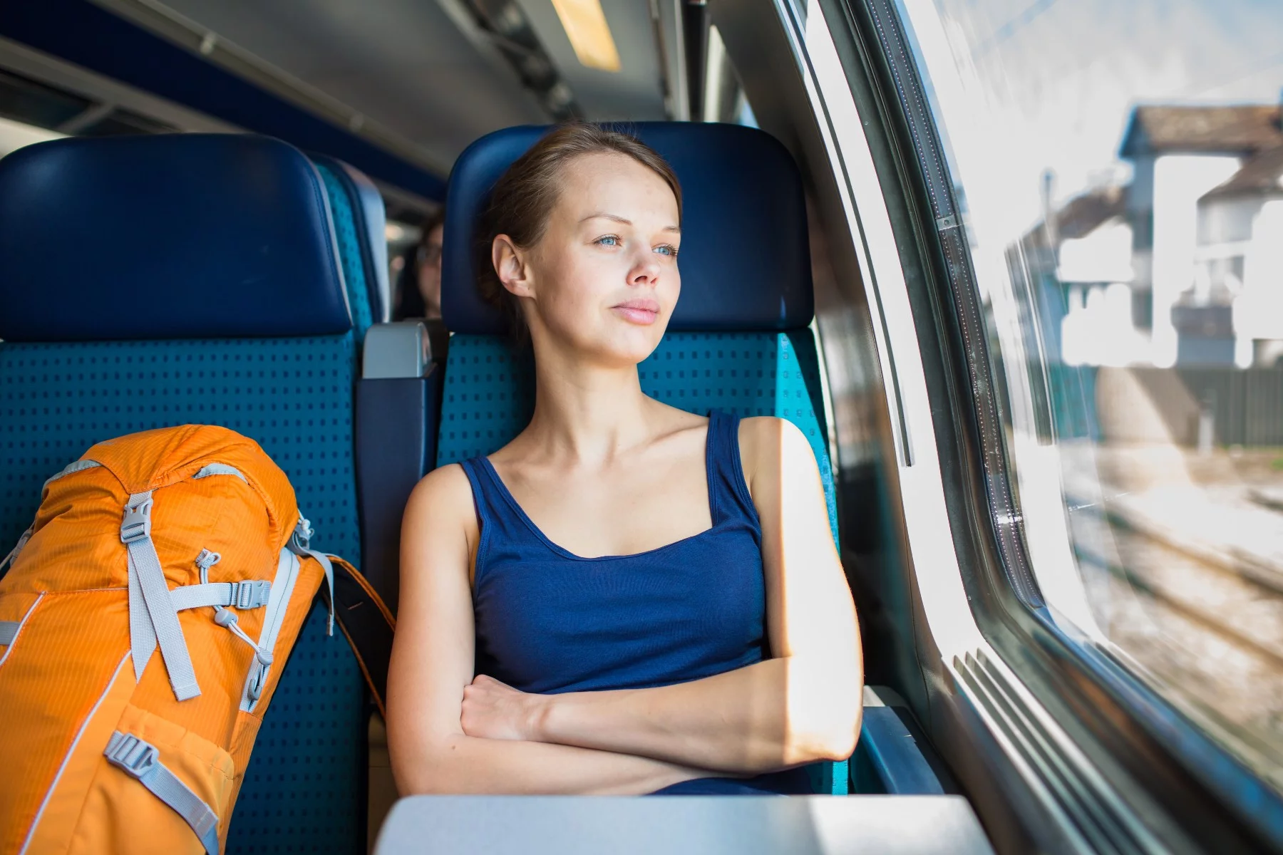 Switzerland holiday travel, woman on train