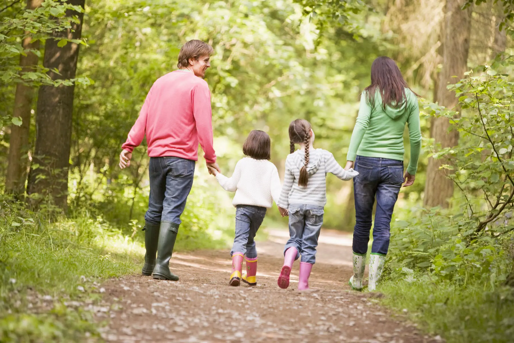 raising kids in Germany: a family walking in the woods