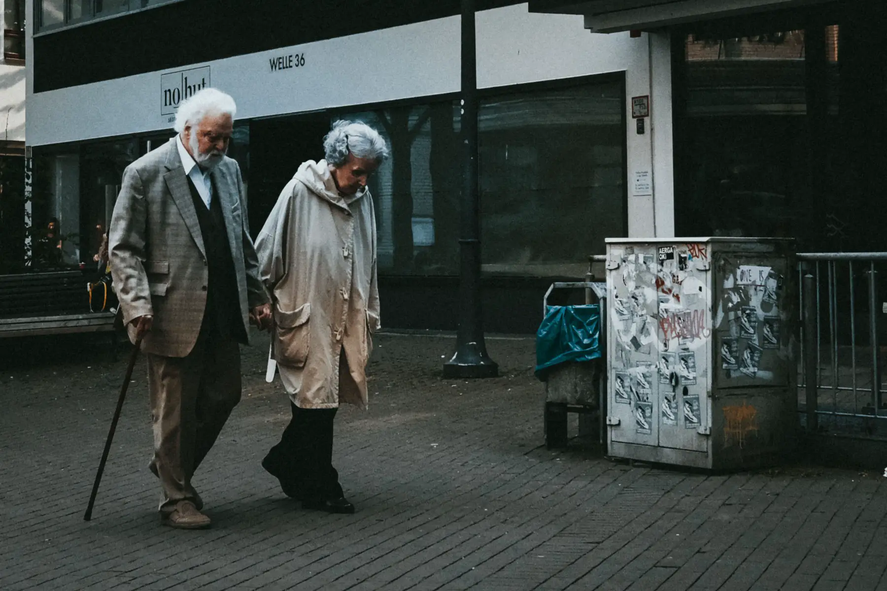 Elderly couple walking hand in hand, in Bielefeld, Germany.