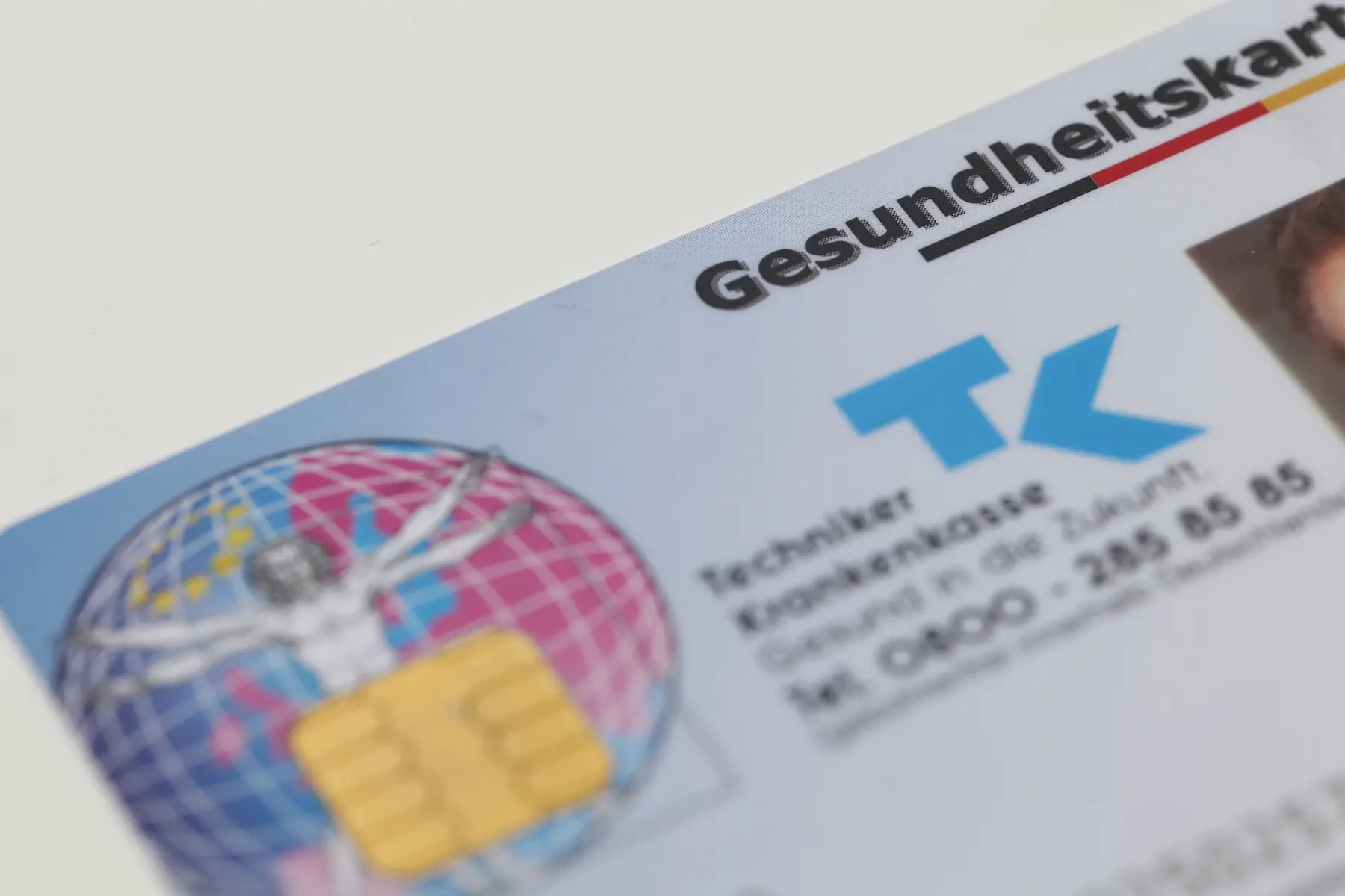 Close-up shot of a Gesundheitskarte (German healthcare card) issued by the public insurance company Techniker Krankenkasse