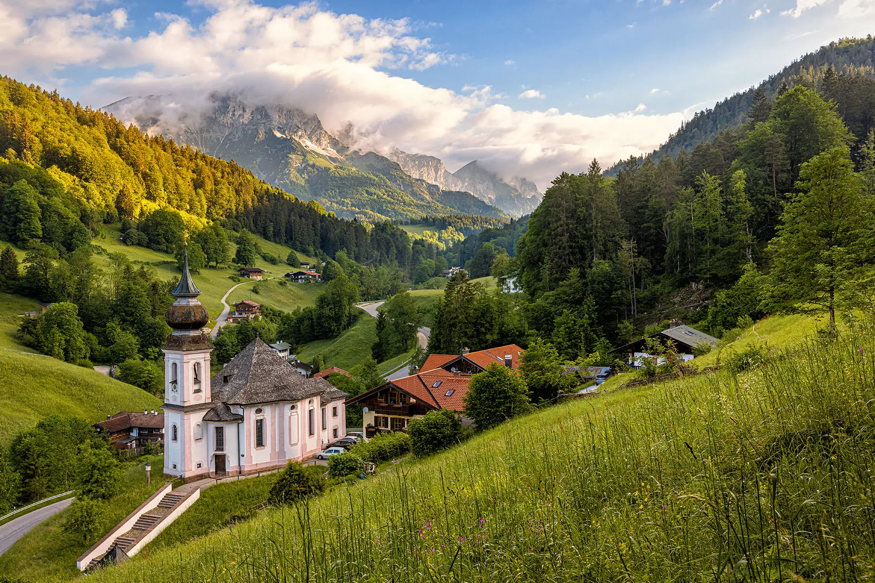 Church Maria Gern on the green slopes of Bavaria with Mt. Untersberg in the background