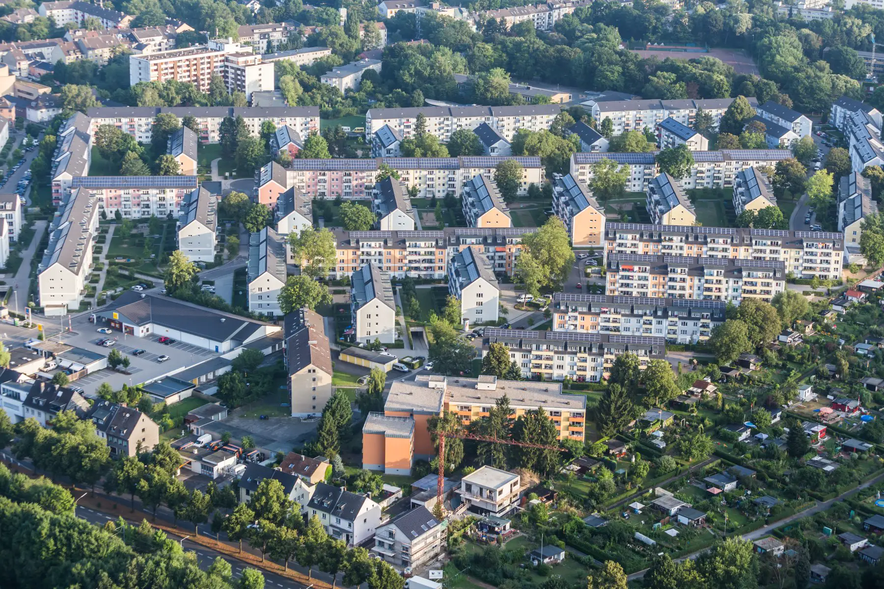 an aerial shot of densely clustered residential blocks in the neighborhood of Vingst in the district of Kalk in Cologne