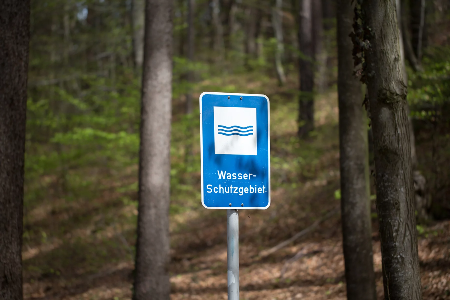 A sign in Bavaria, Germany denoting a Wasserschutzgebiet, or an area used for drinking water