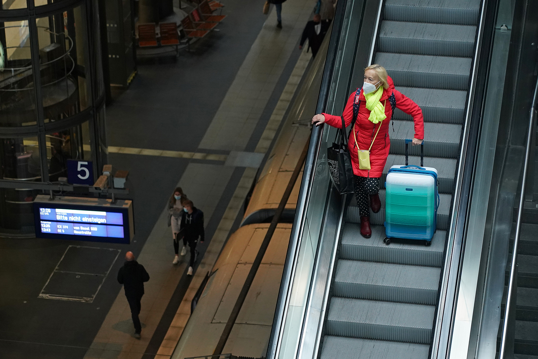 Woman wearing a FFP2 face mask at Berlin Hauptbahnhof during the COVID-19 pandemic in Germany