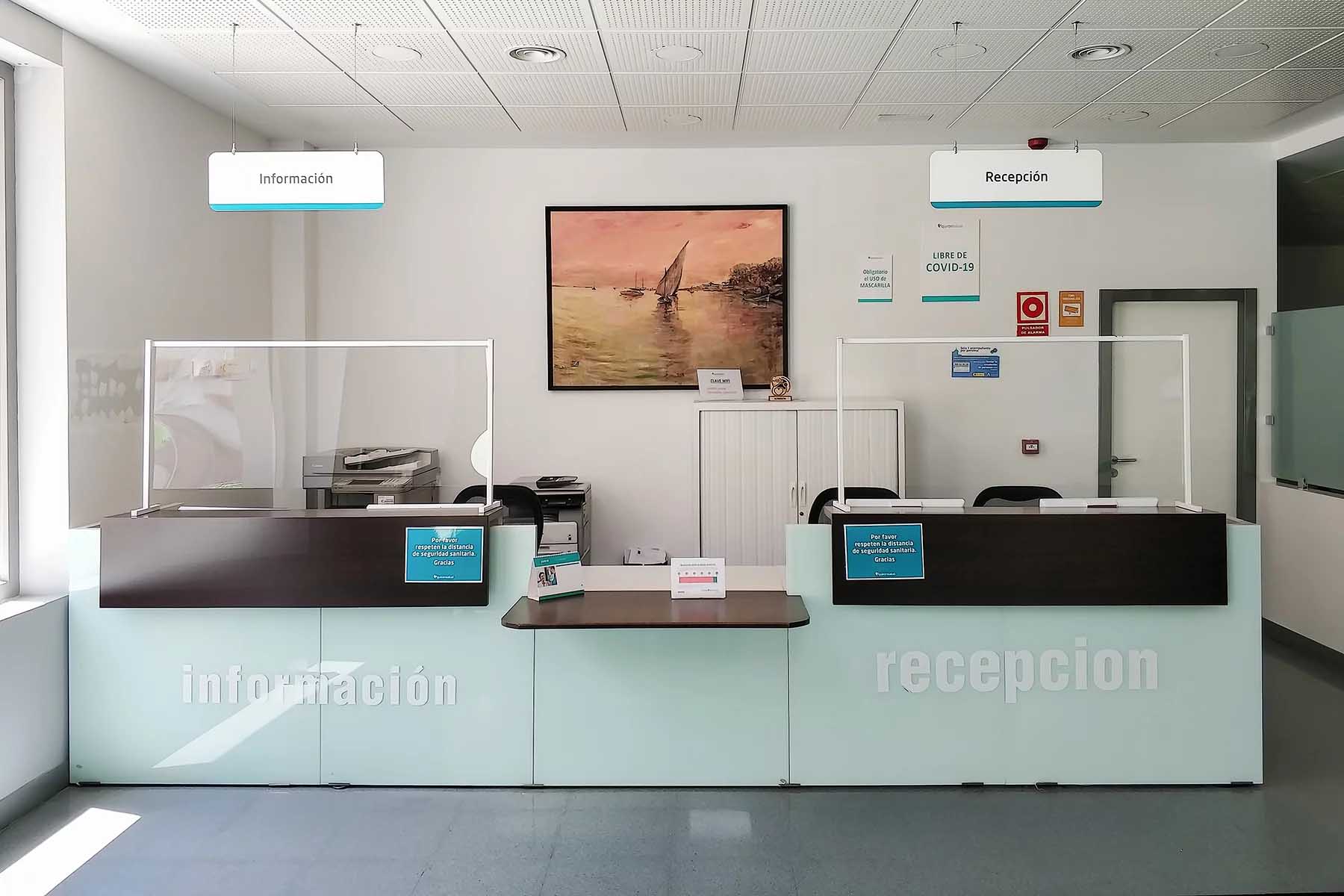 An empty reception desk at a medical clinic in Huelva, Spain