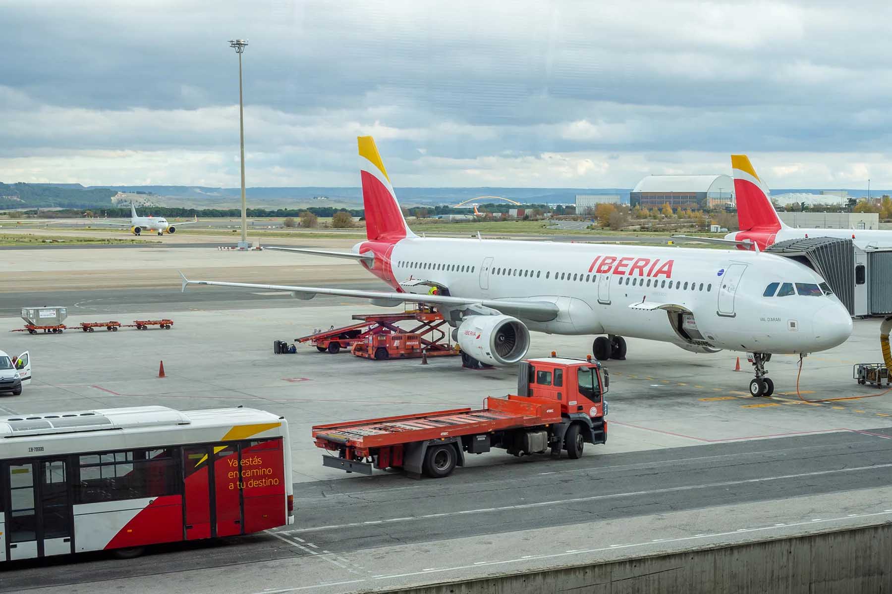 Iberia airplane standing on the runway.