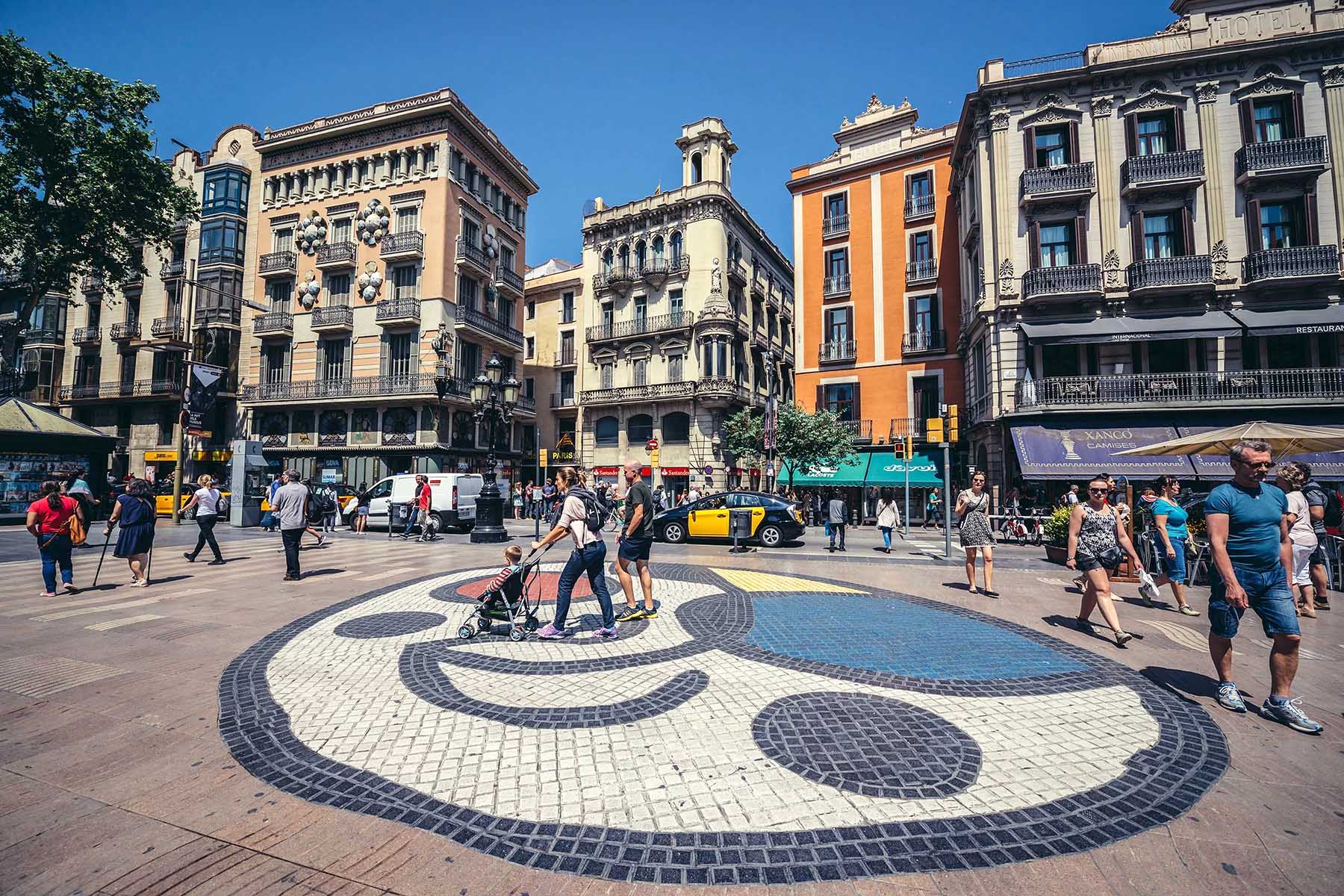 People walking on a square in Barcelona city center.