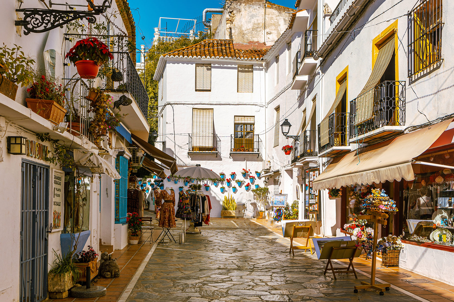 Paved street and white houses in Marbella old town