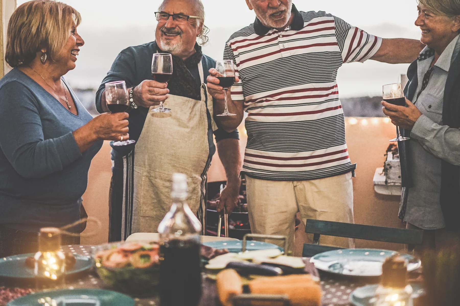 A group of pensioners in Spain drinking wine