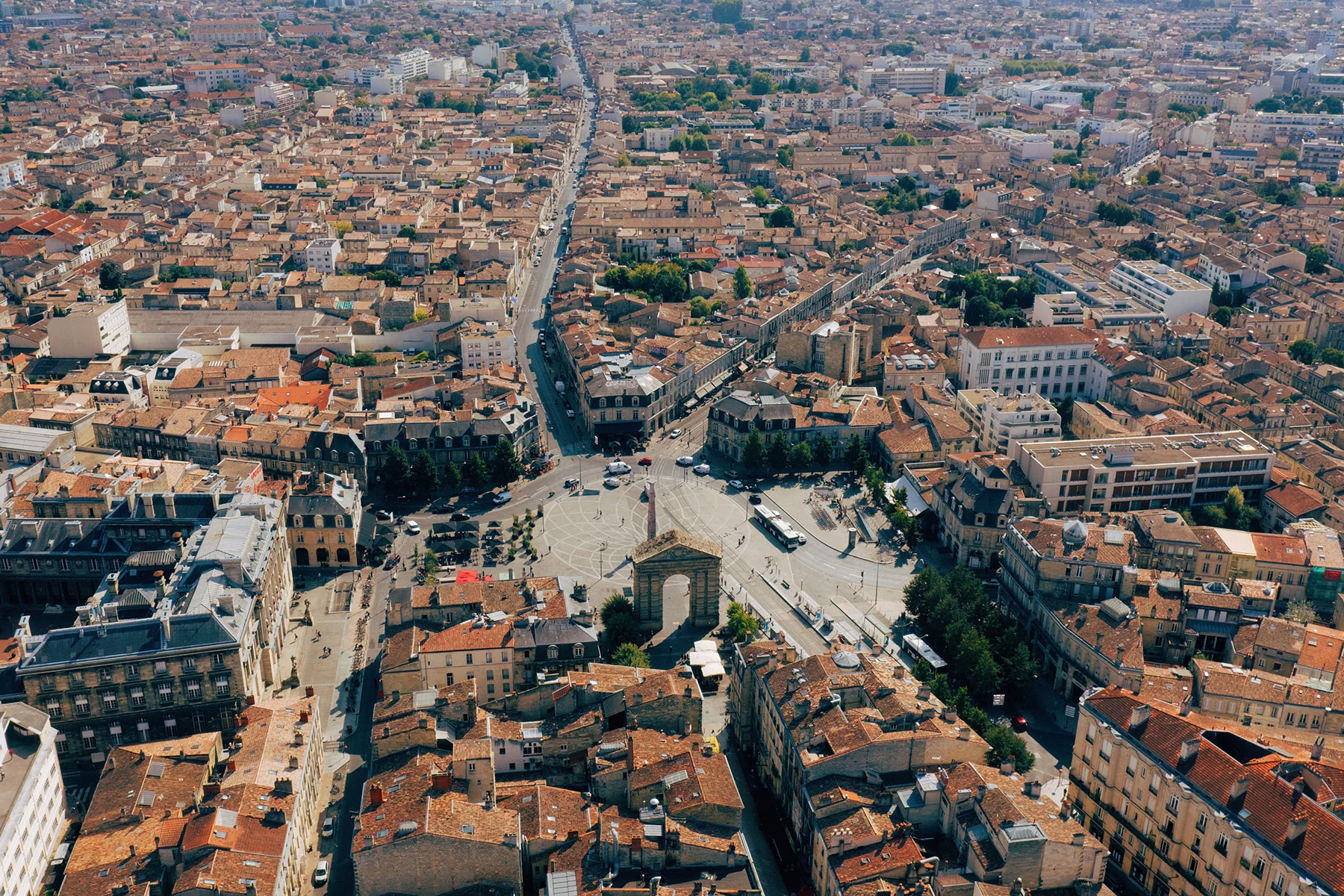 An aerial view of Bordeaux showing red-tiled roofs