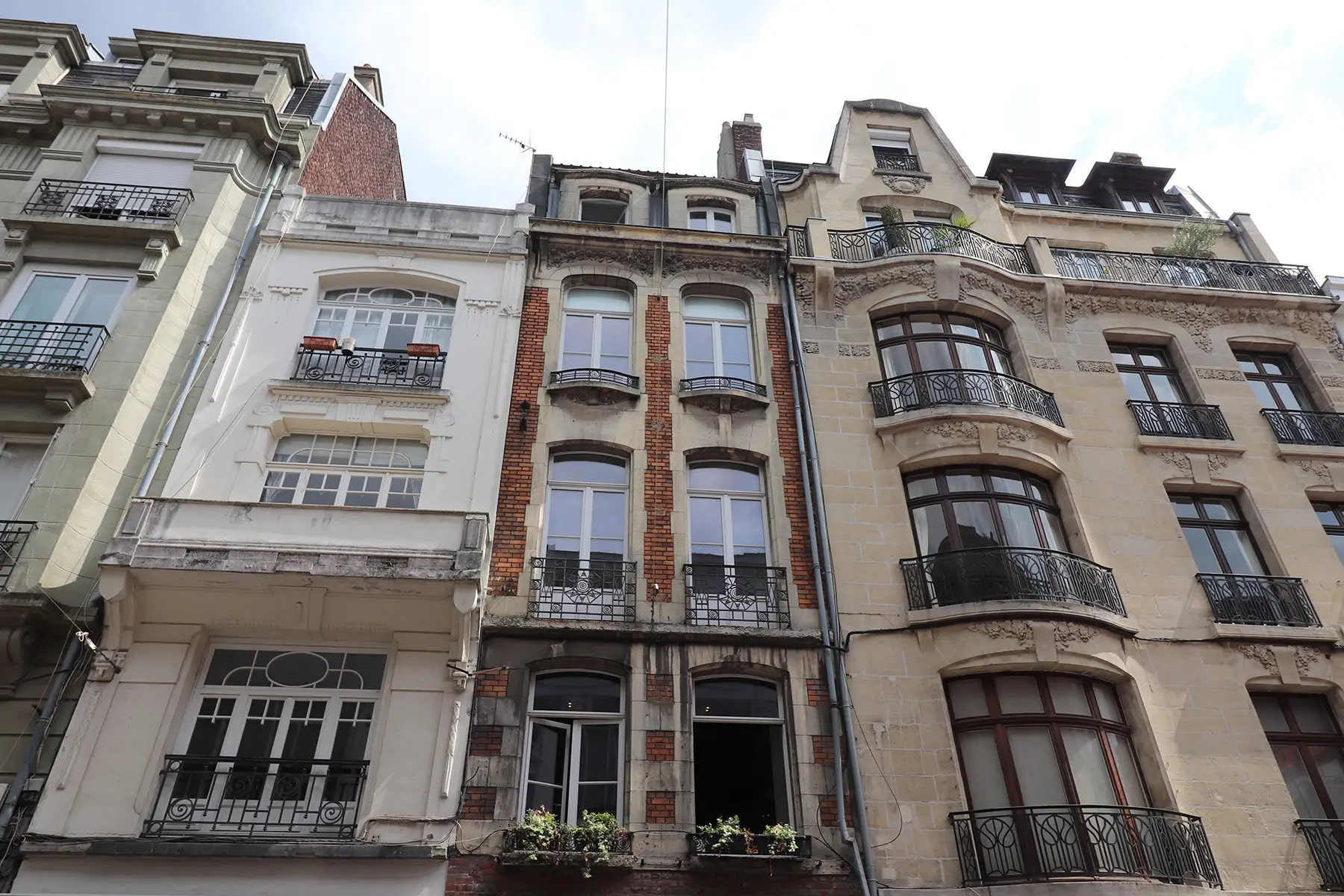 Façade of an old-fashioned apartment building in Lille