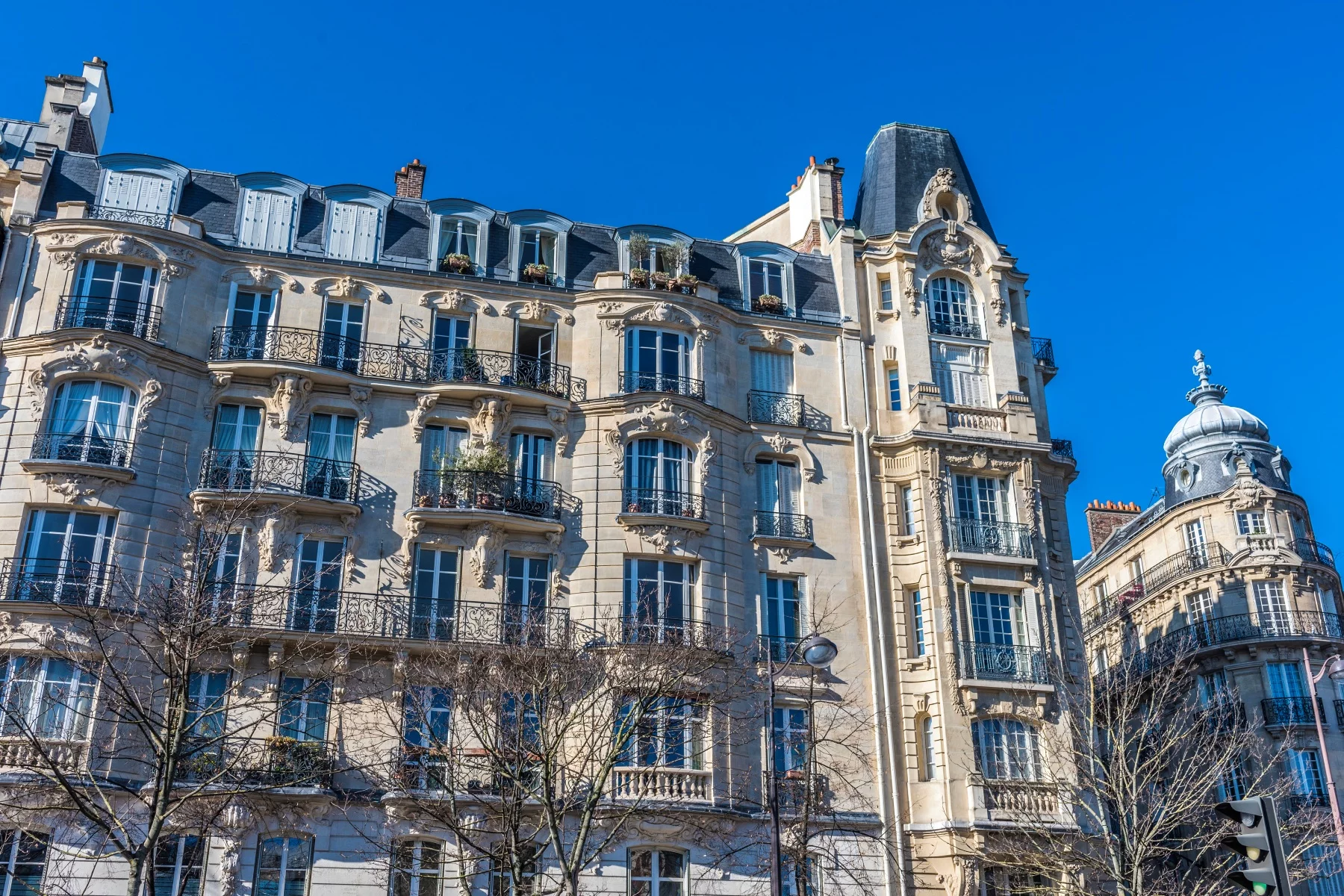 the exterior of apartment buildings on Boulevard Raspail in the 14th arrondissement of Paris 