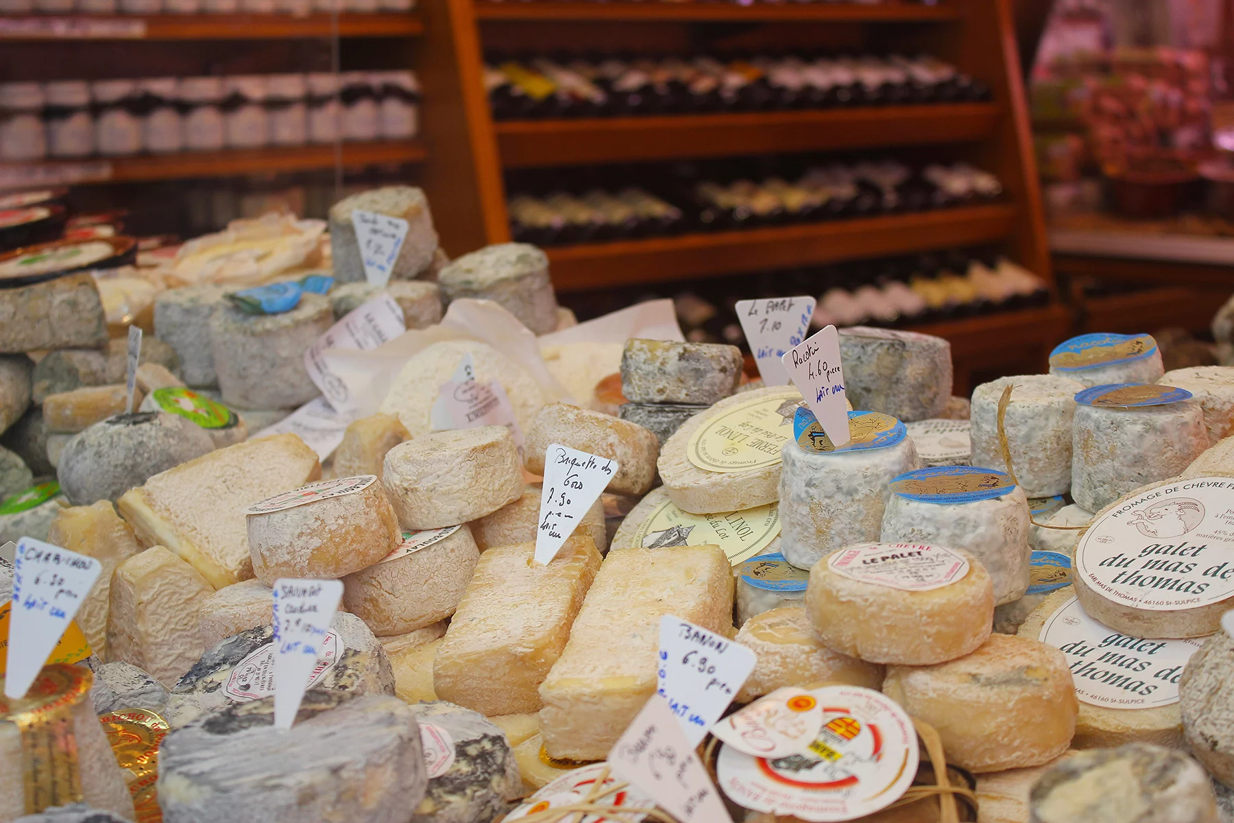 Wide selection of cheese at a shop in Paris