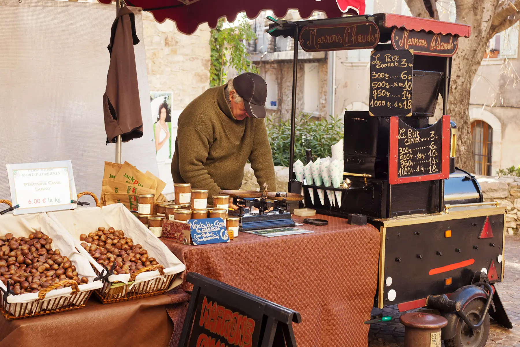 French entrepreneur selling roasted chestnuts