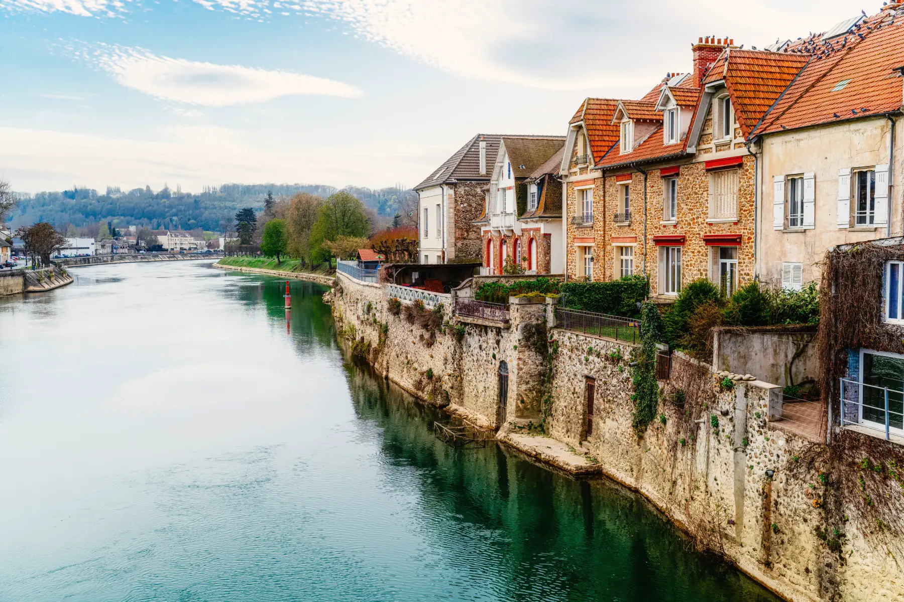 pretty houses along the Marne River in the village of La Ferte sous Jouarre, in the Seine-et-Marne district of France