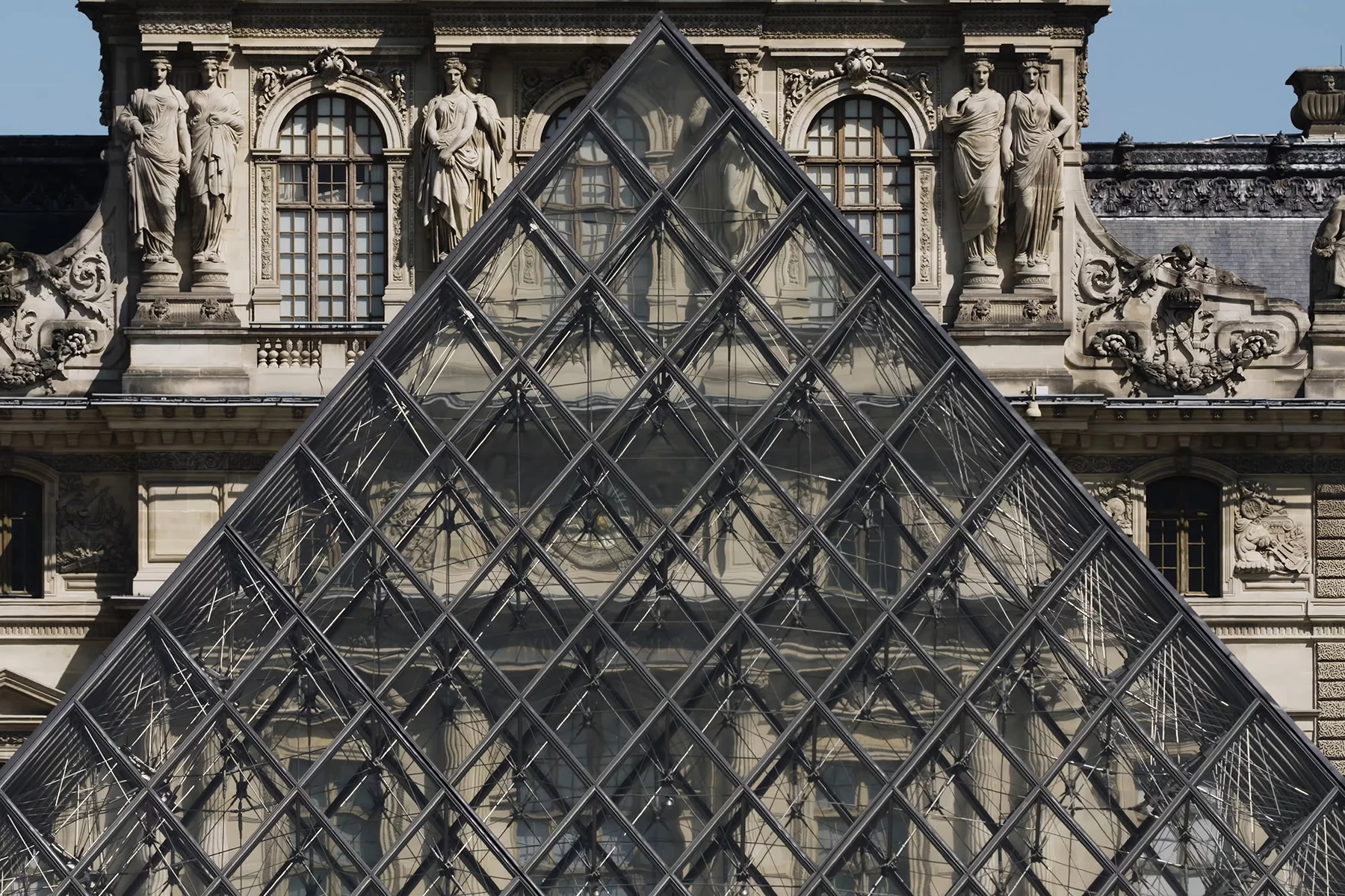The famous glass pyramid of Le Louvre