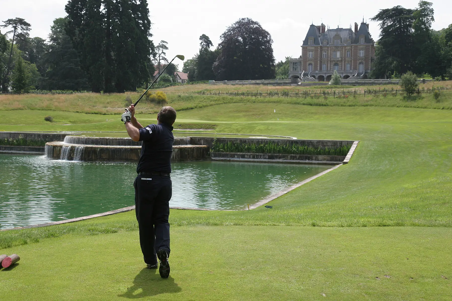 A man golfing at Paris International golf club