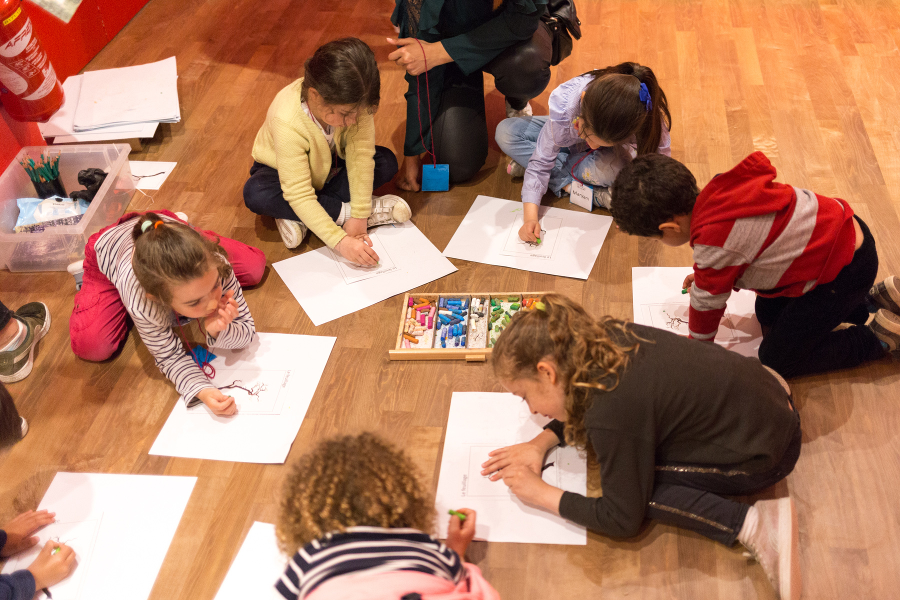 children drawing during a lesson at a French primary school 